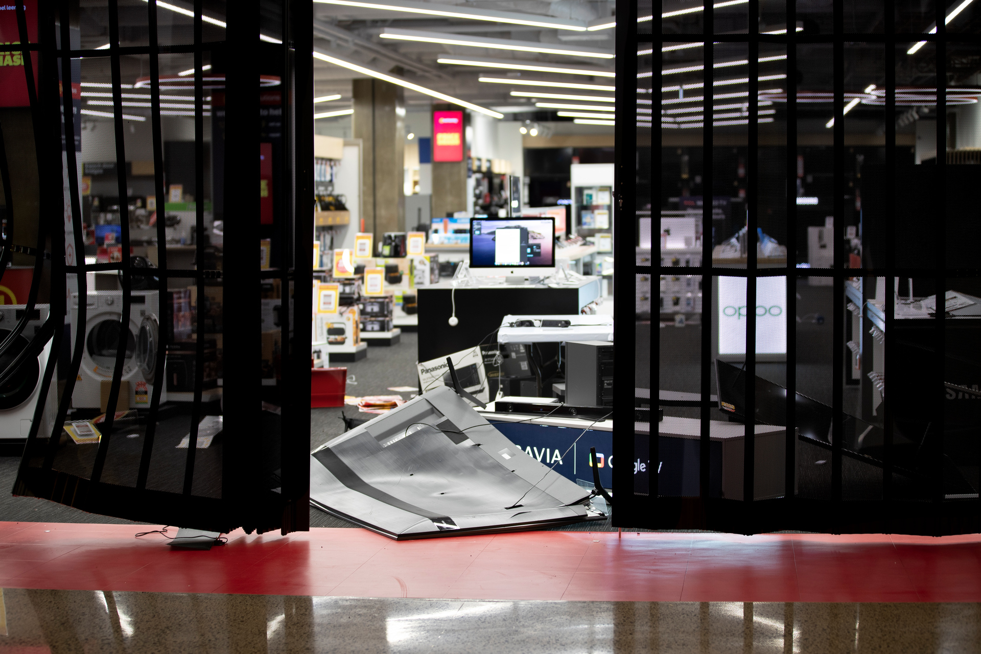 A large television was destroyed during the ram raids. Photo / Hayden Woodward