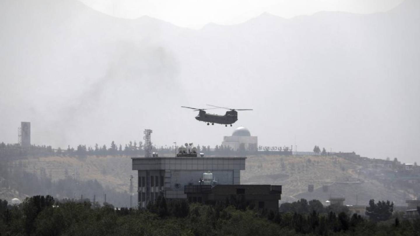 A US Chinook helicopter flies over the US Embassy in Kabul, Afghanistan. Photo / AP