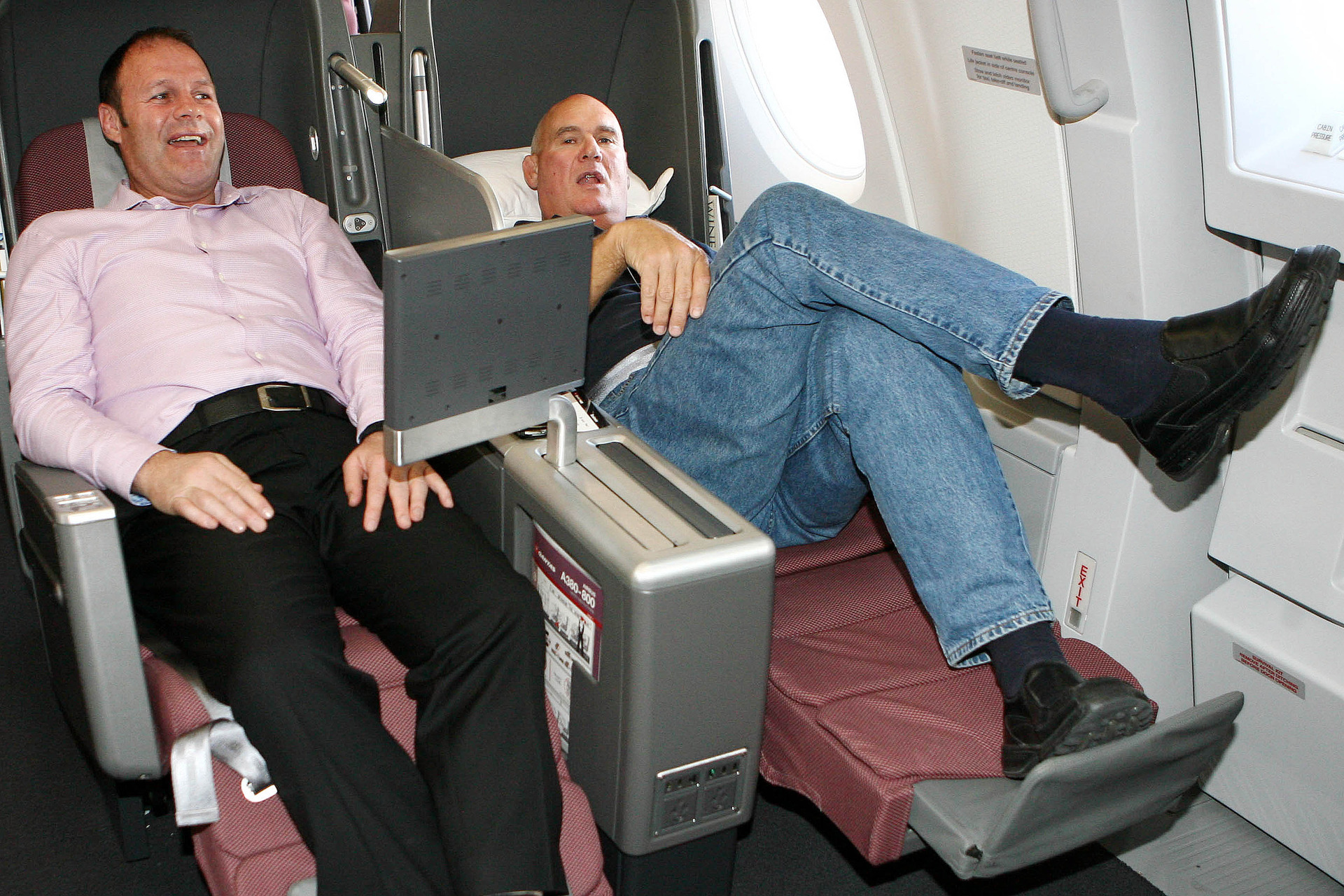 Former All Blacks Alan Whetton and Andy Haden stretch out in business class on the Qantas Airbus A380 on its first visit to New Zealand in 2008. Photo / NZPA