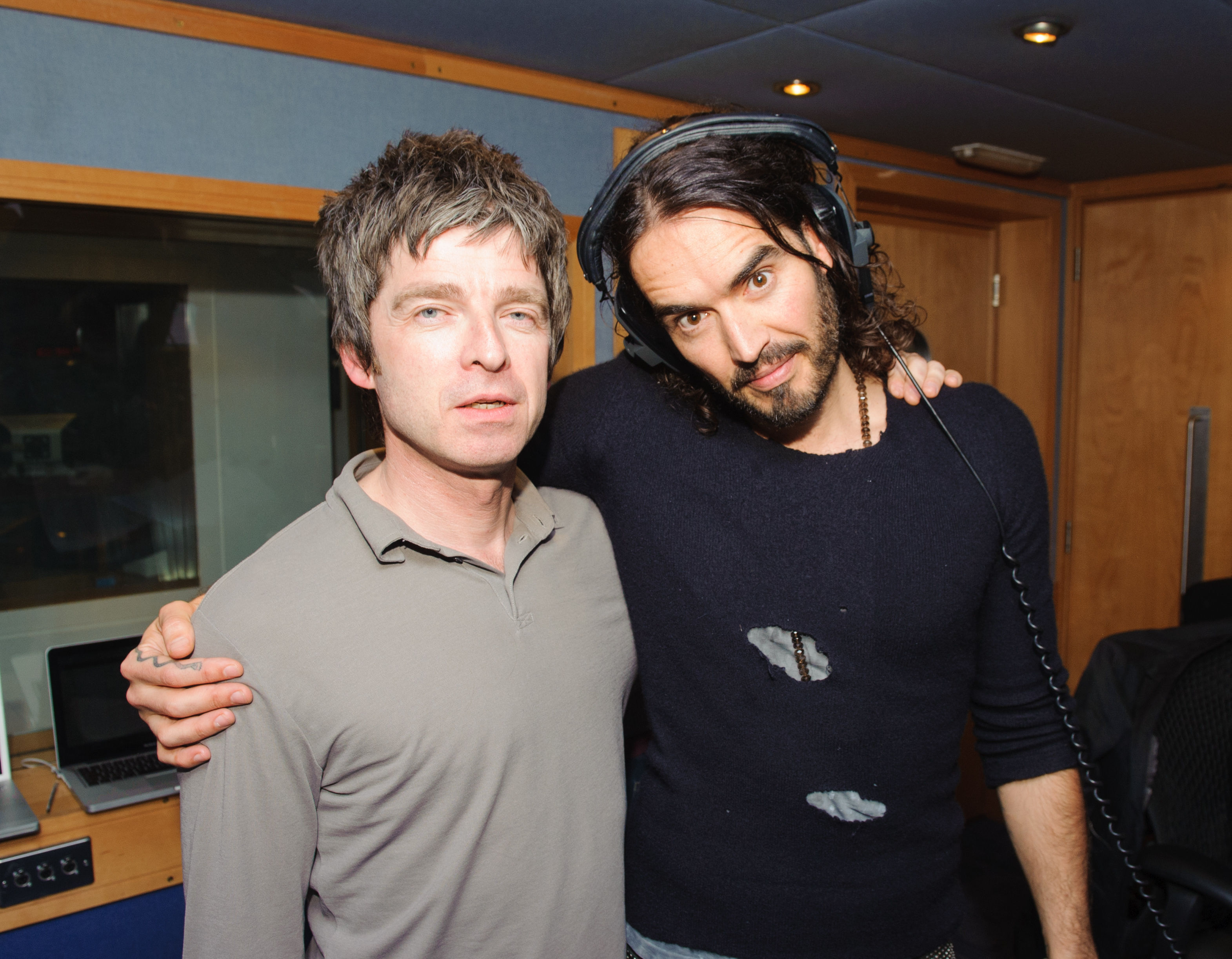 Noel Gallagher (left) and Russell Brand during Russell Brand's XFM radio show, at Global Radio, in central London. Photo / Getty Images