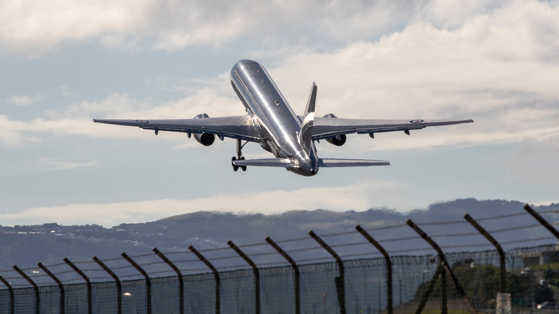 A RNZAF Boeing 757 taking off from Wellington Airport. Photo / Mark Mitchell