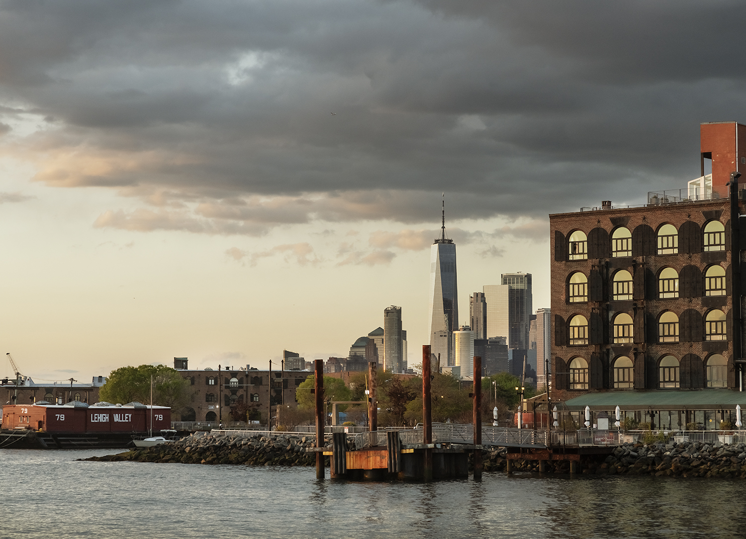 Matthew and Allison's waterfront apartment is a warehouse building with handsome arched windows in the Red Hook neighbourhood in New York City. Photo / Matthew Williams