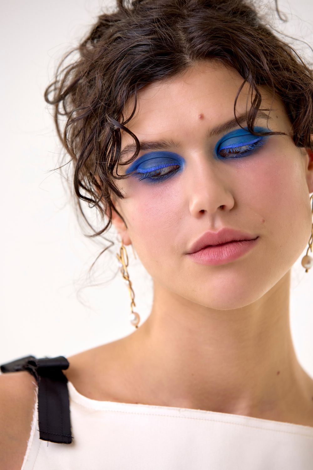 Harris Tapper top $569. Ceremony by Mia Straka earrings $760. Photo / Babiche Martens