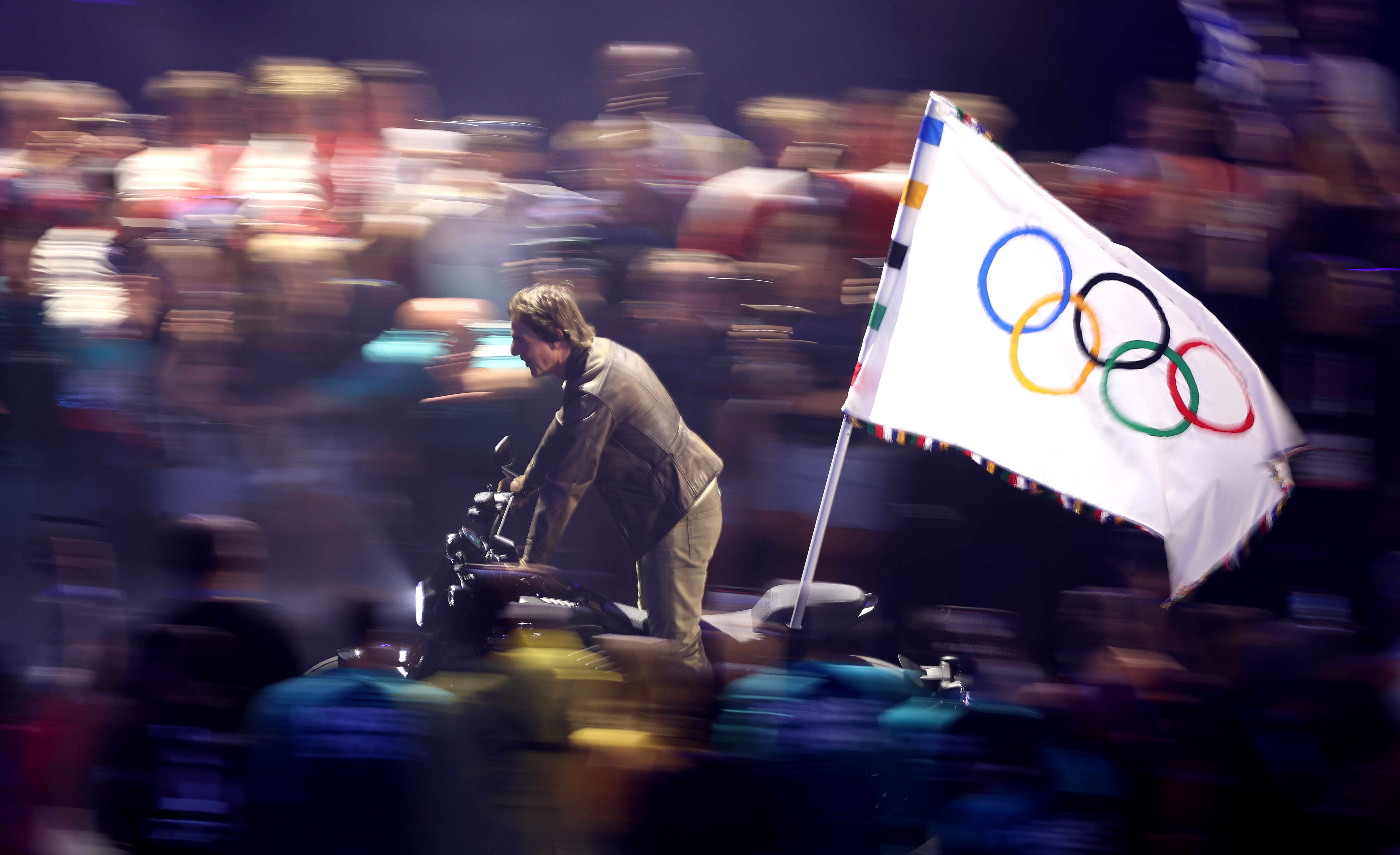 Cruise exited the Stade de France on a motorbike. Photo / Getty Images