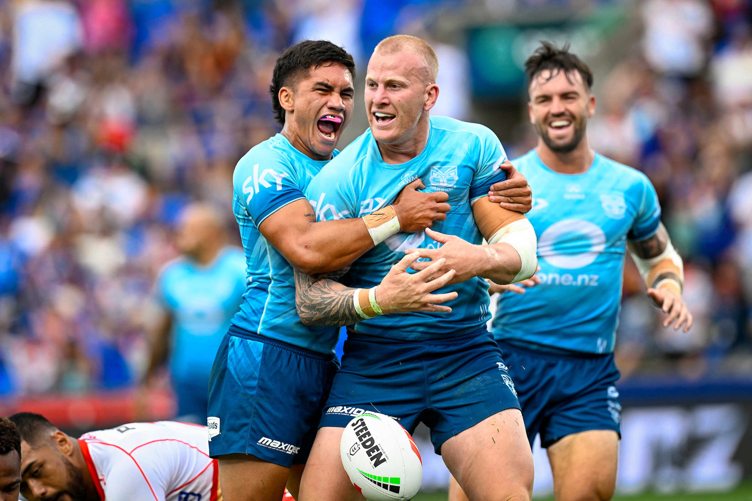 Mitch Barnett celebrates scoring in the Warriors' pre-season win over the Dolphins. Photo / Photosport
