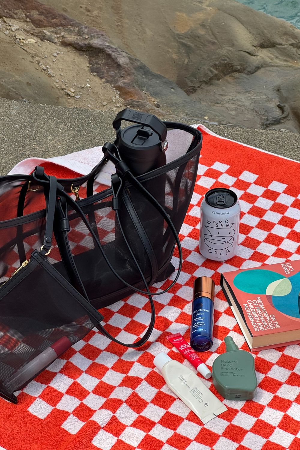 If you've ever been curious about what everyone else is toting in their oversized beach bags, now's your chance to have a nosy. Photo / Zeenat Wilkinson