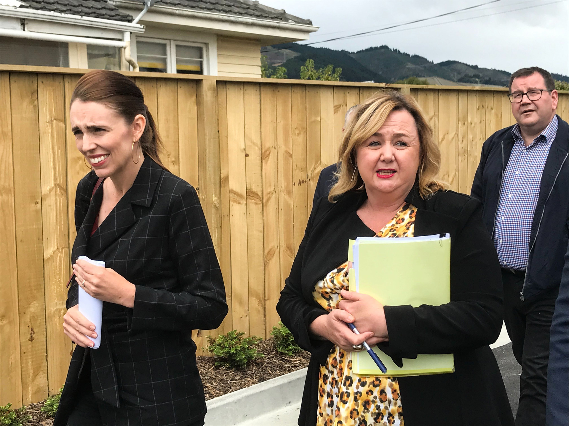 Prime Minister Jacinda Ardern flanked by Housing Minister Megan Woods and Finance Minister Grant Robertson on their way to the press conference. Photo / Jason Walls