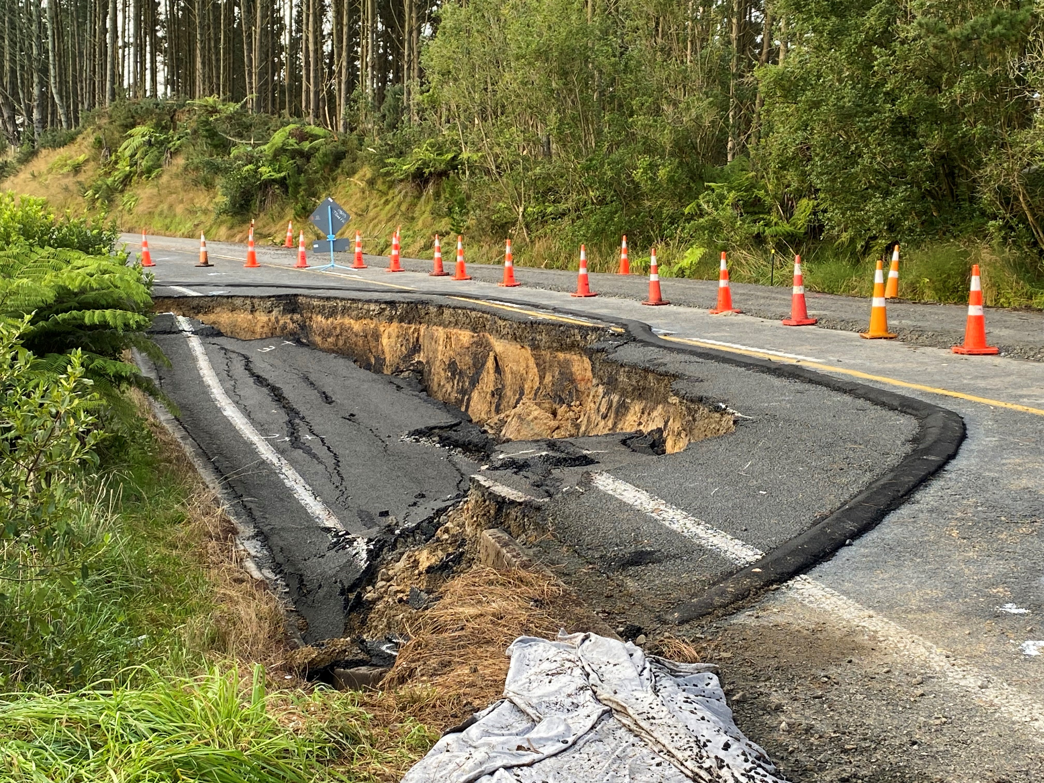 The closed section of SH23 pictured on Tuesday February 7 after the road slumped. Photo / Waka Kotahi