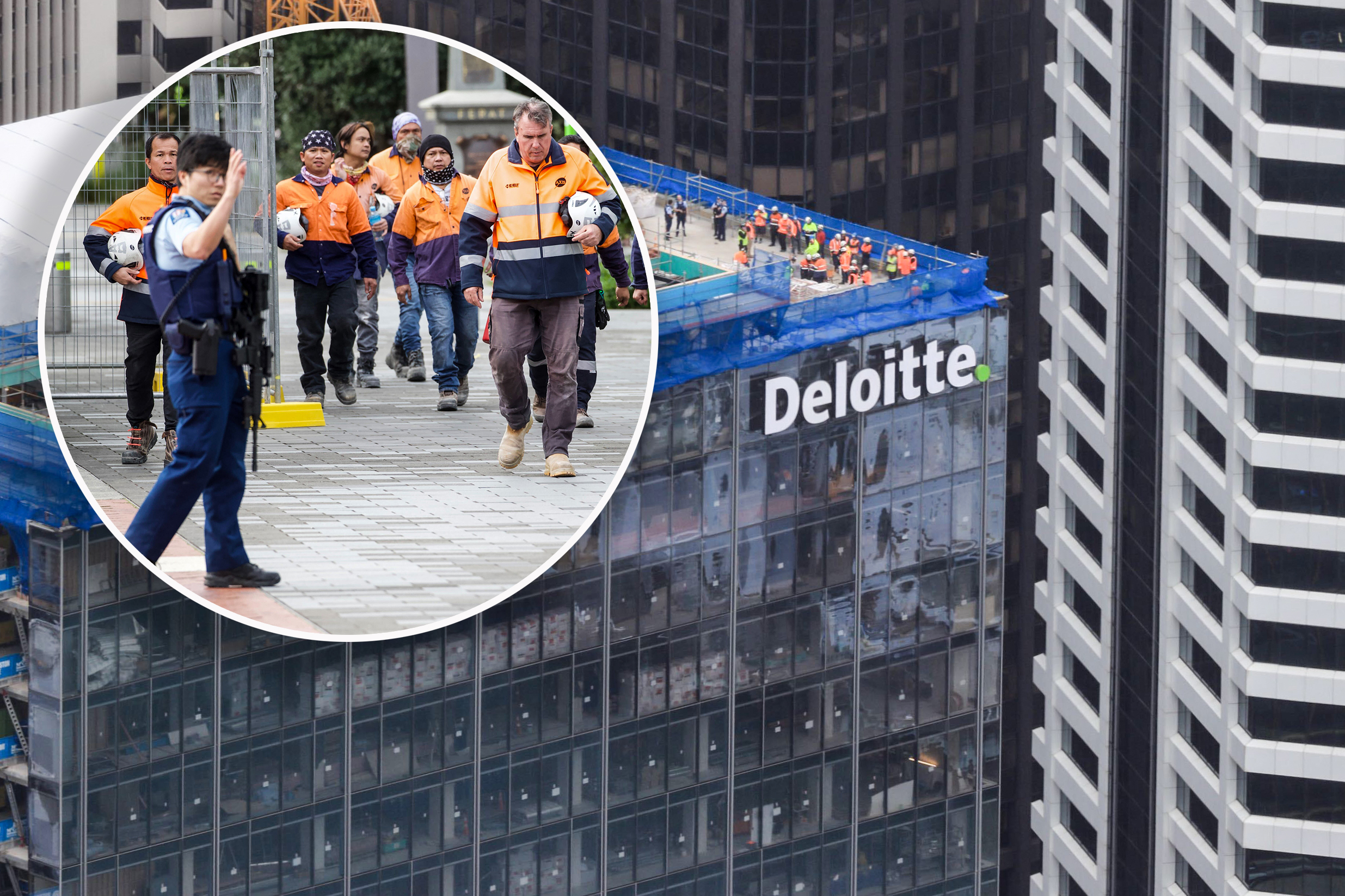 Workers sheltered on the roof of a construction site as emergency services dealt with the scene of an active shooter in downtown Auckland. Photo / Hayden Woodward