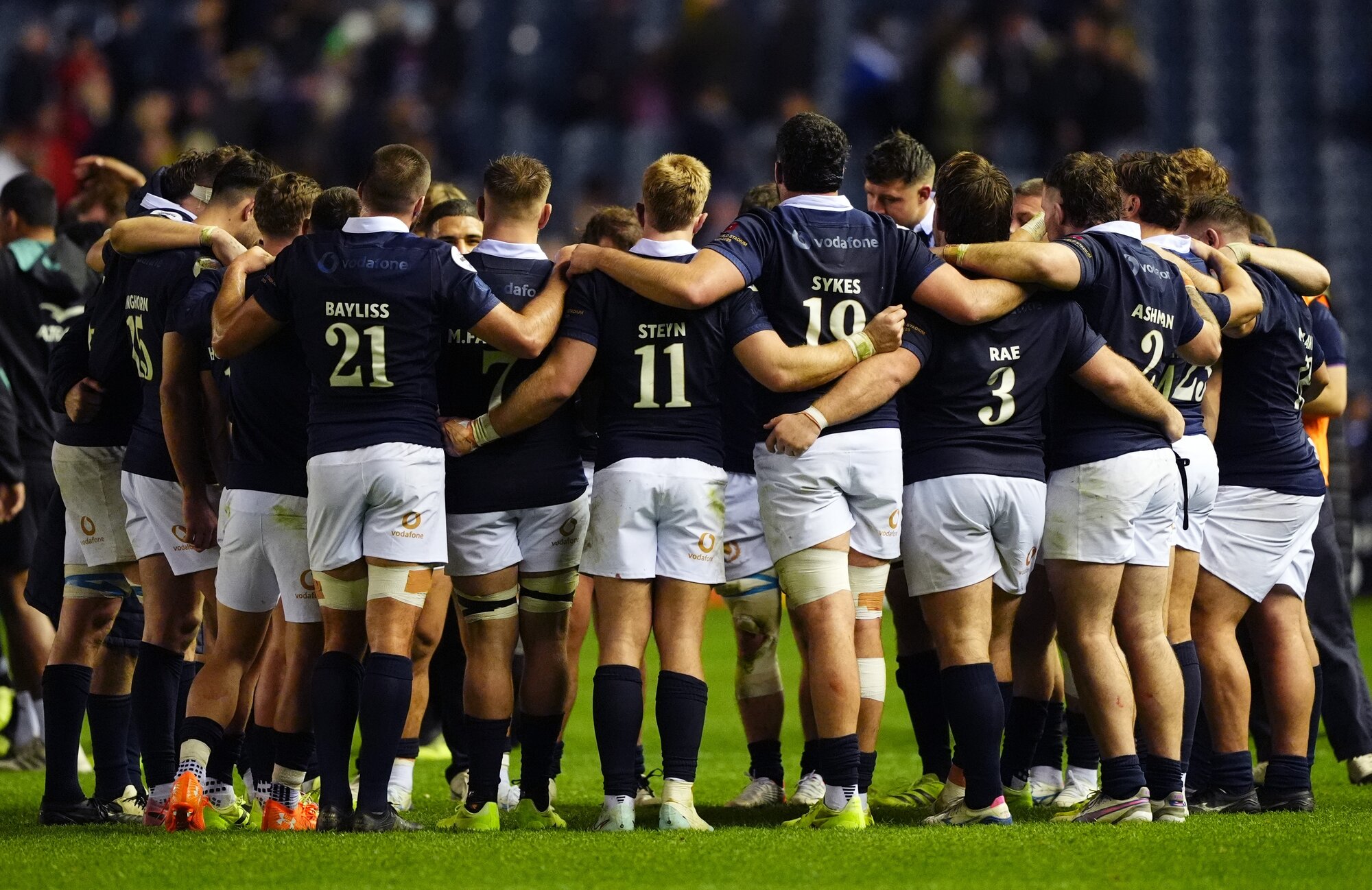 Scotland players share a moment during their match against the All Blacks in Edinburgh. Photo / Getty Images