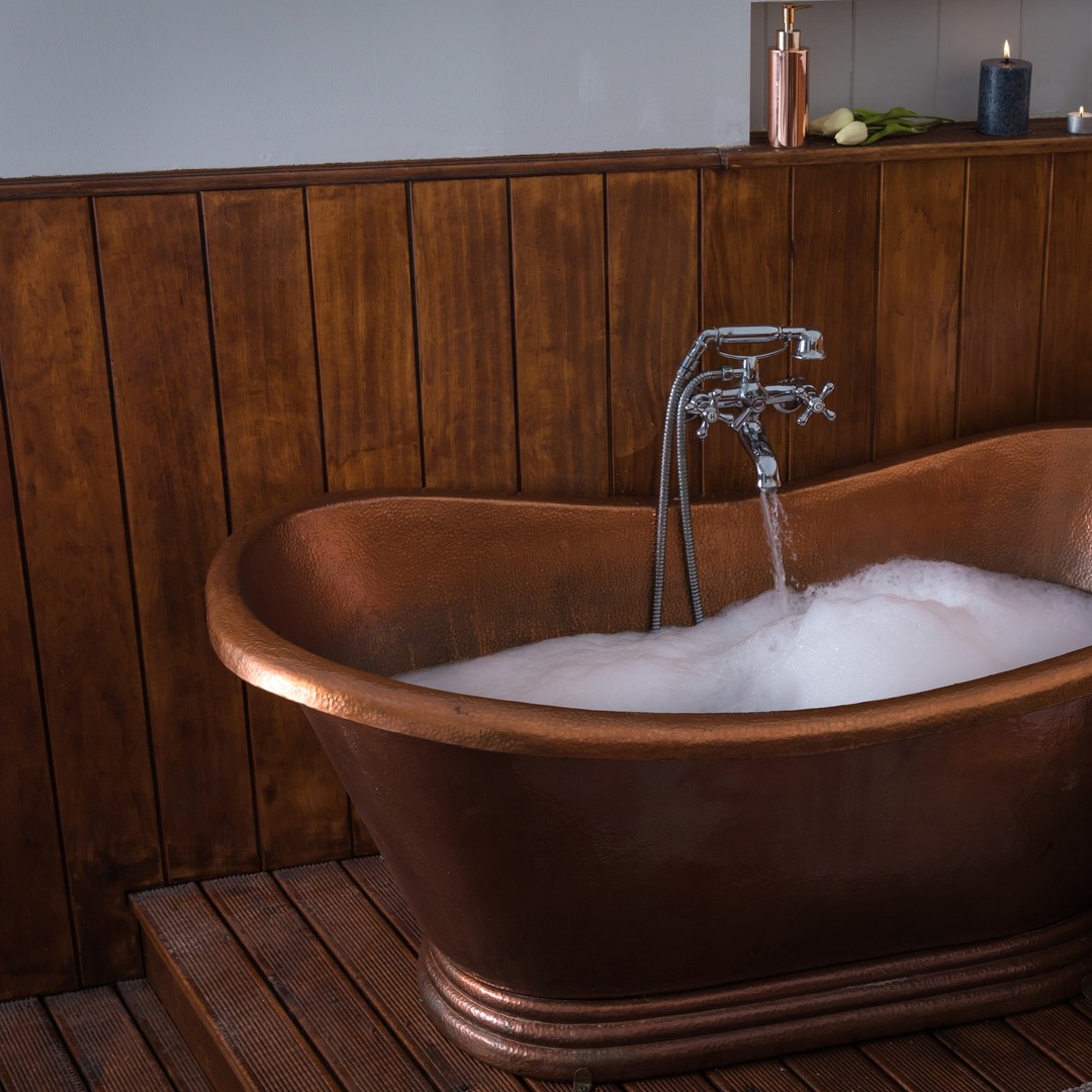 Relax in a copper tub at Body Haven Day Spa. Photo / @Bodyhaven_nz
