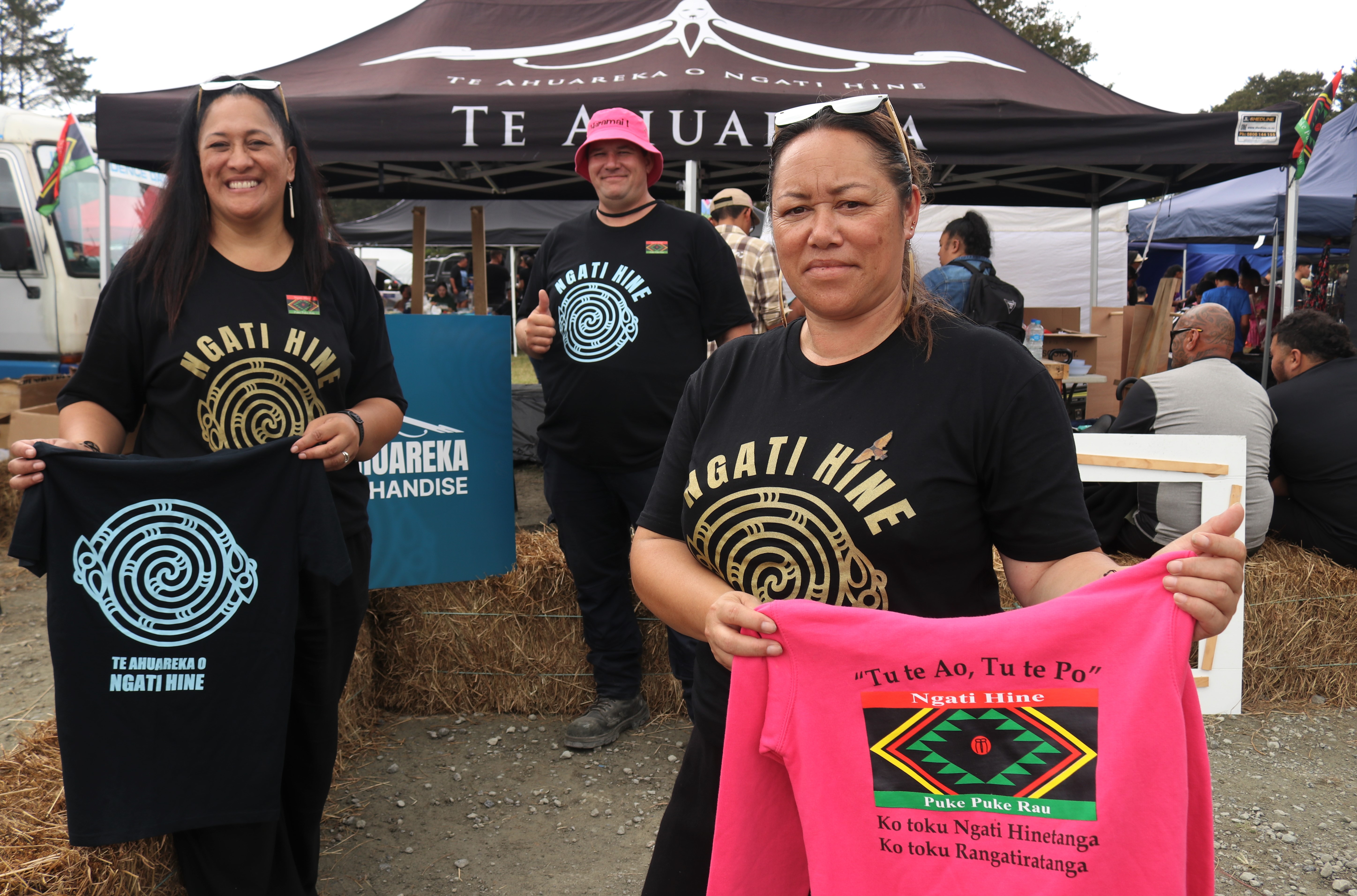 (From left): Keeping sales pumping at the Te Āhureka merchandise stand are Nisha Marsh, Raphael Polson and Suzie Scott. Photo / Peter de Graaf