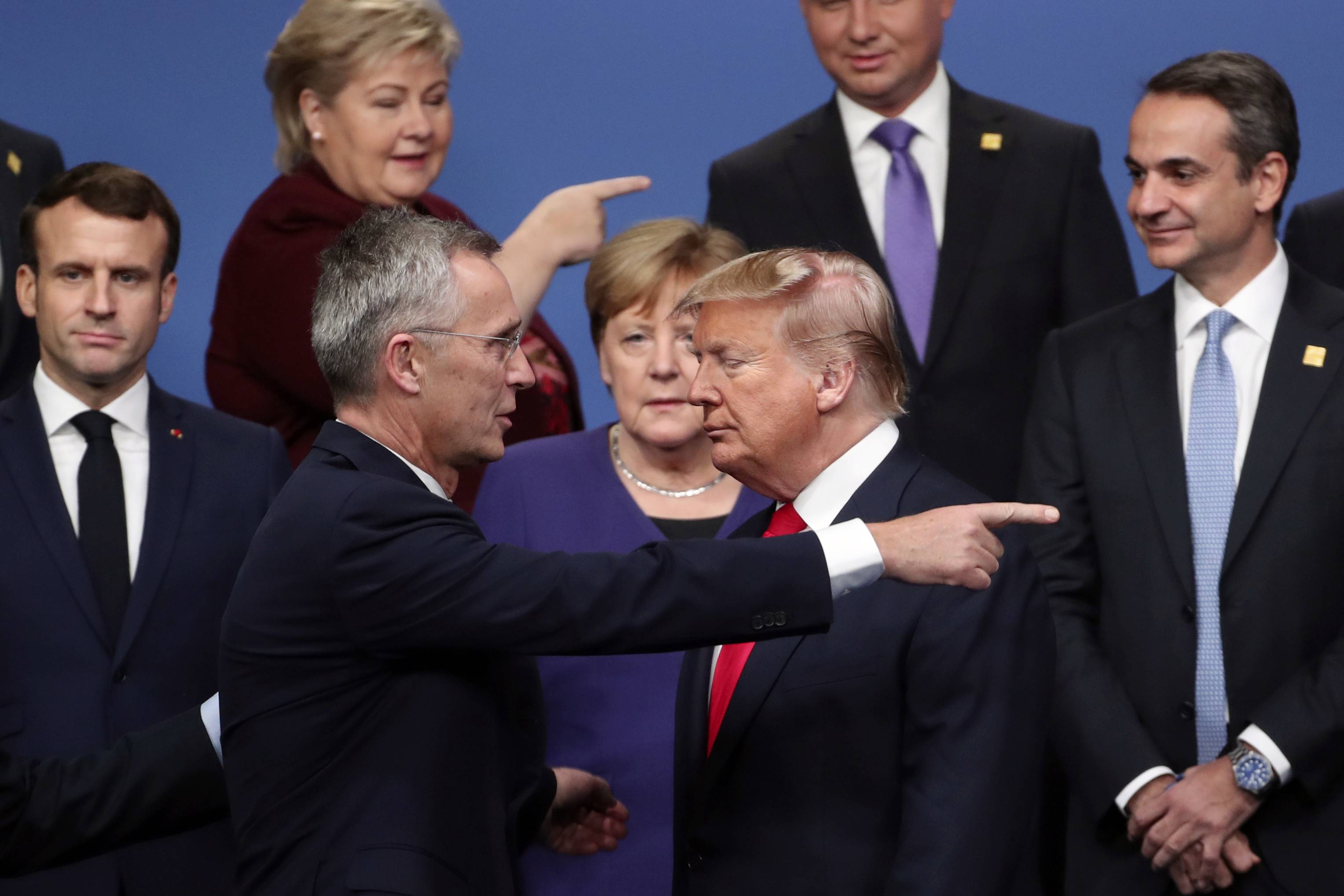 Nato Secretary-General Jens Stoltenberg speaks with Donald Trump after a group photo at a Nato leaders meeting in England on December 4, 2019. Photo / AP