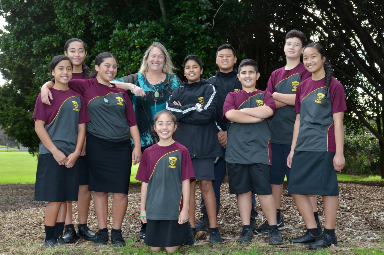 Papatoetoe Intermediate School principal Pauline Cornwell (standing fourth from left) said her school was forced to cancel its camp. 