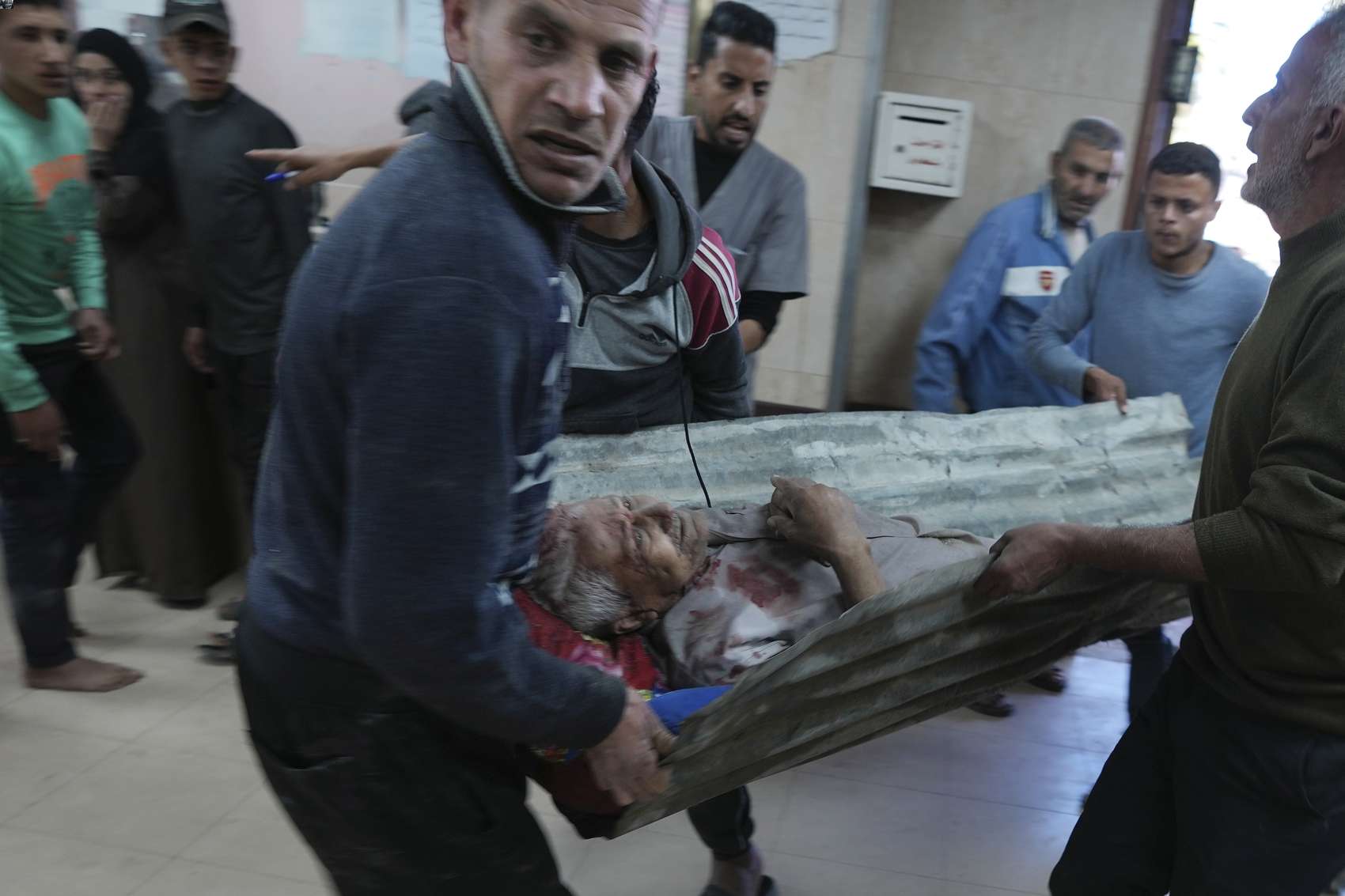 Palestinians wounded in the Israeli bombardment of the Gaza Strip are brought to Al-Aqsa Martyrs Hospital. Photo / AP