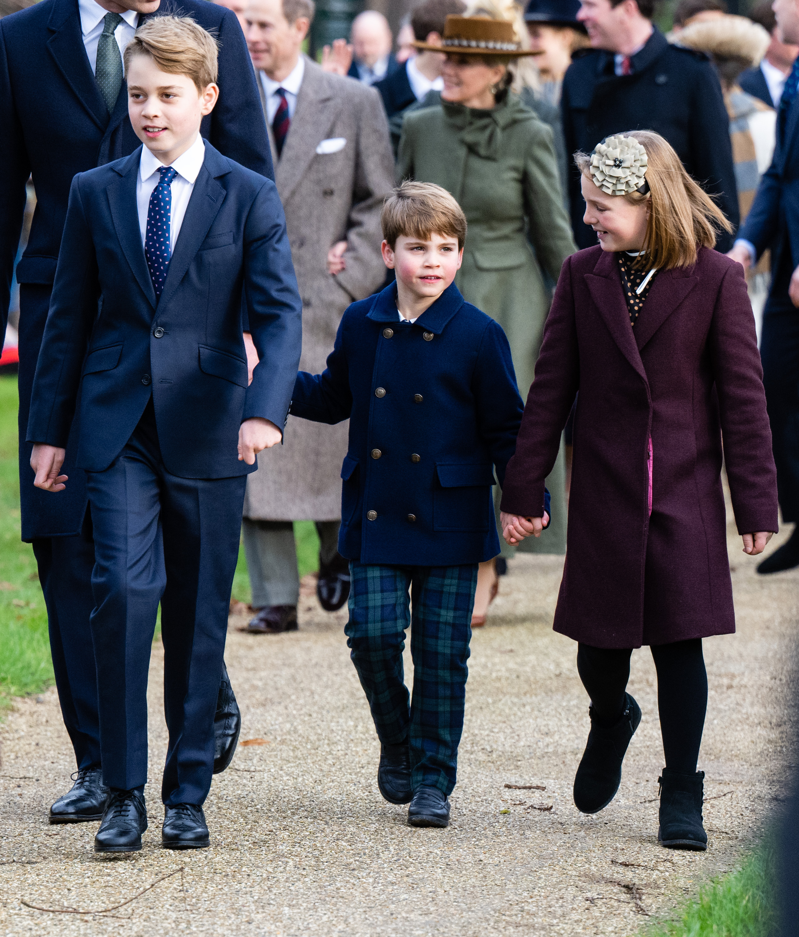 Well-wishers greet the youngsters after Monday morning's youthful and joyous service at St Mary Magdalene Church. Photo / Getty Images