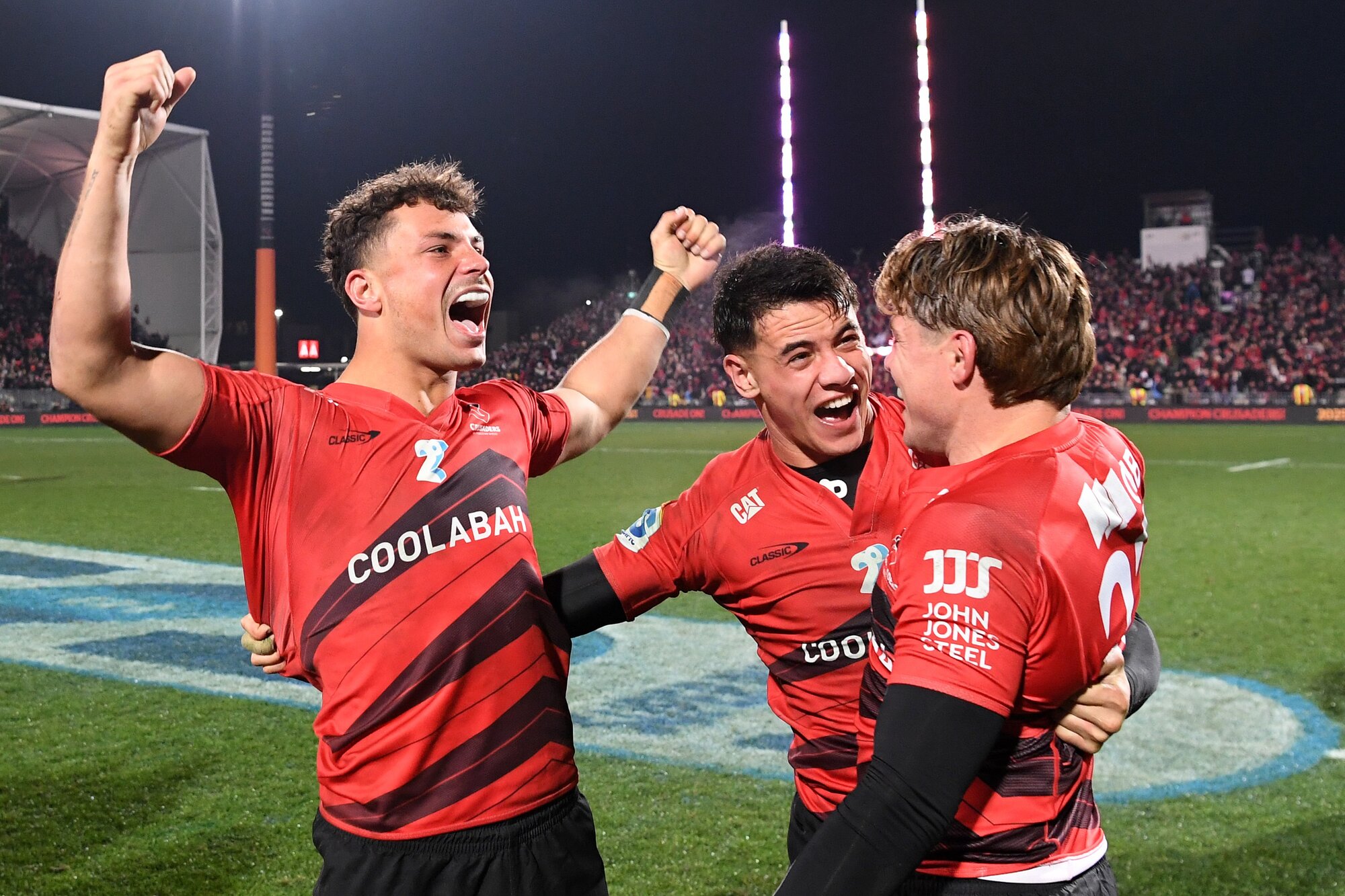 Macca Springer (from left),  Rivez Reihana and James O'Connor celebrate the Crusaders' win over the Chiefs. Photo / Getty Images