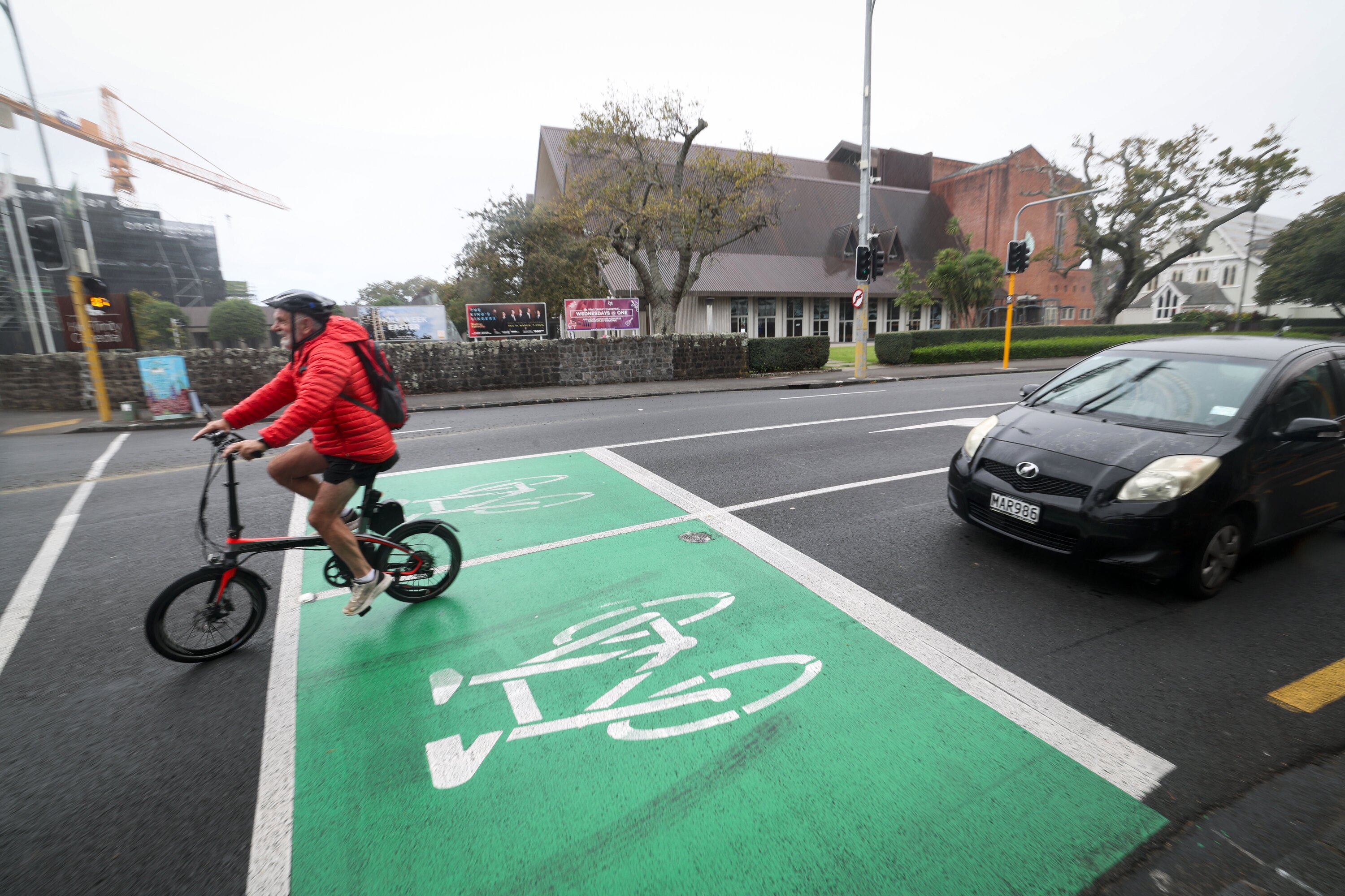 A cyclist on Parnell Rd, near where David Seymour crashed his bike outside the Parnell Cathedral. Photo / Jason Oxenham