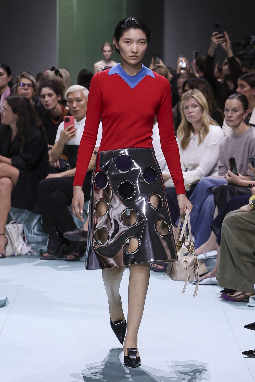 Primary hues and striking cut outs in an otherwise simple outfit.