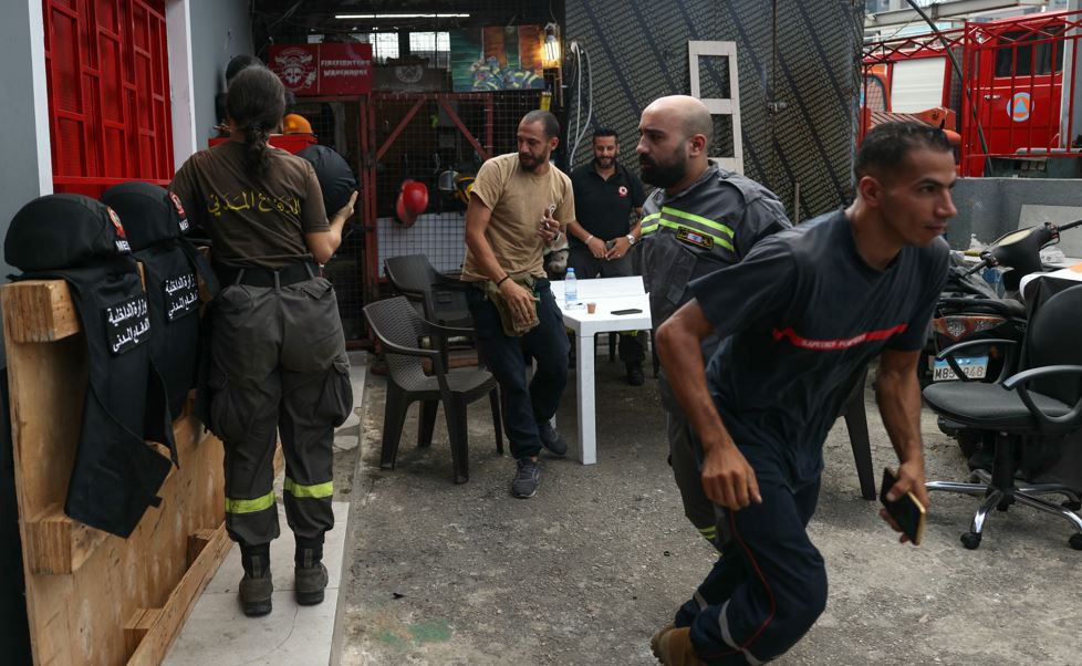 Members of Lebanon's Civil Defence at their station in Beirut prepare to respond to an emergency. Photo / AFP