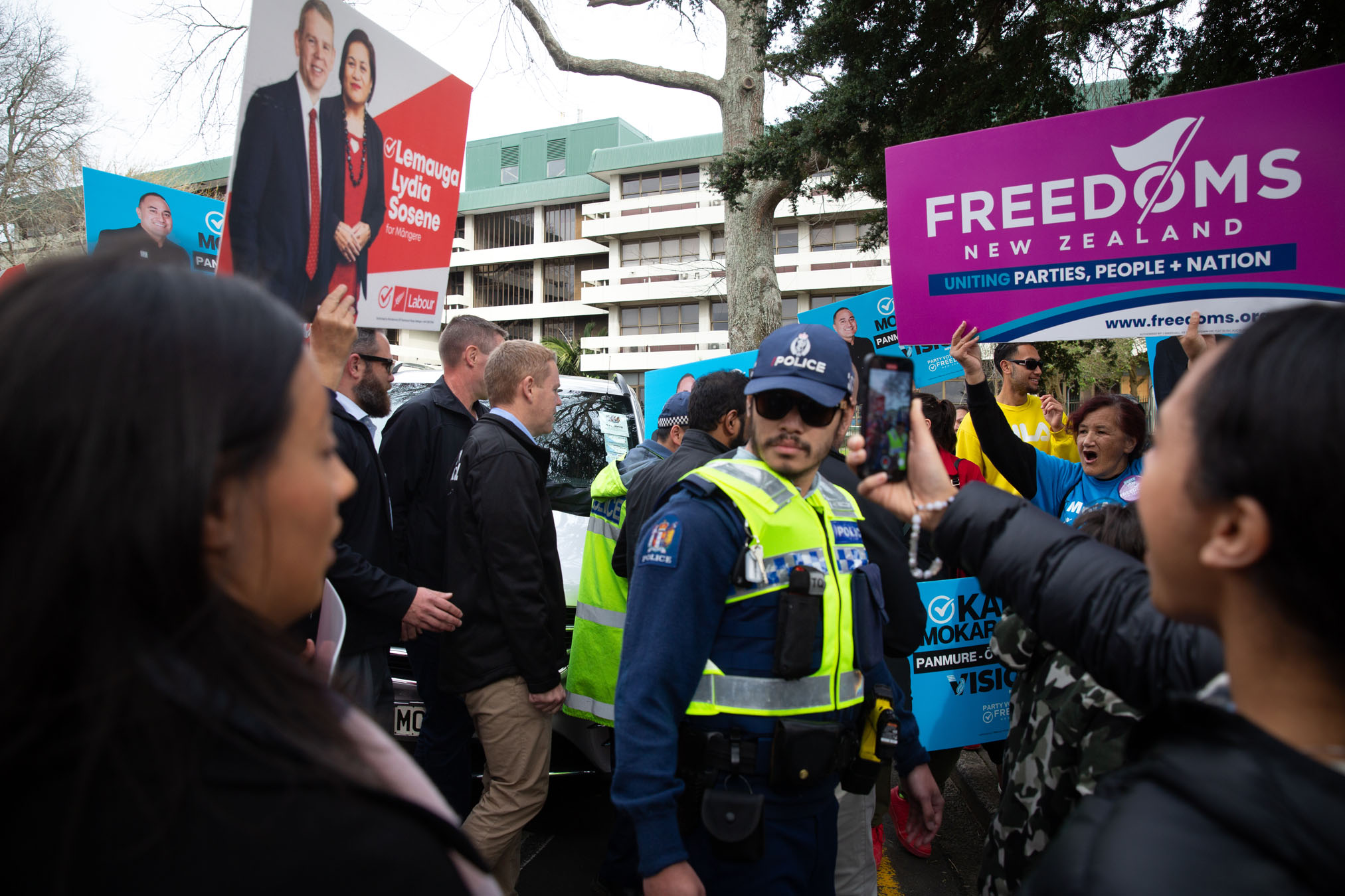 Freedoms NZ party members disrupted a campaign visit by Prime Minister Chris Hipkins to the Otara markets. Photo / Sylvie Whinray