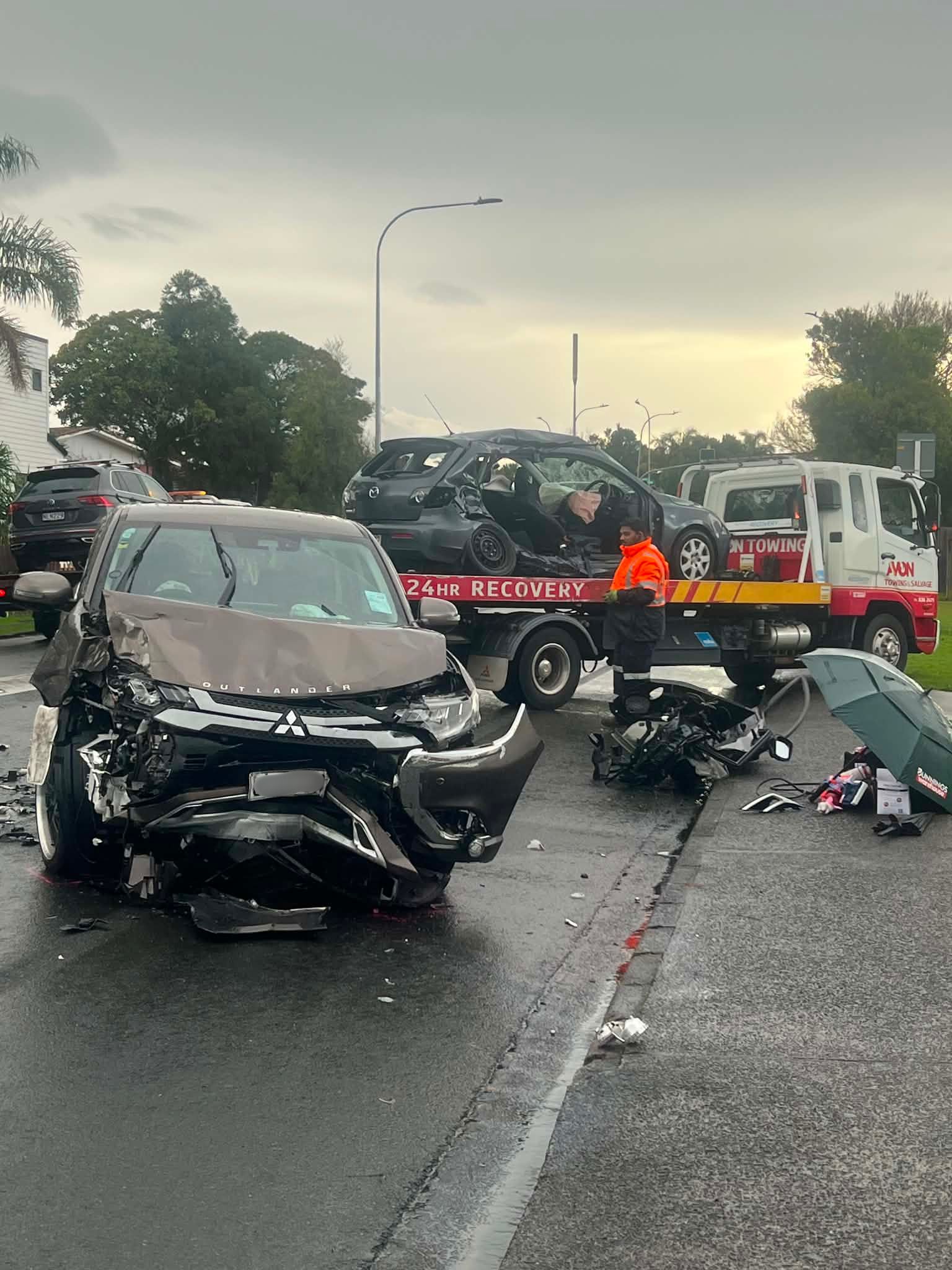 An SUV and a hatchback were involved in the crash on Te Atatū Rd. Photo / Mia Angela Duindam