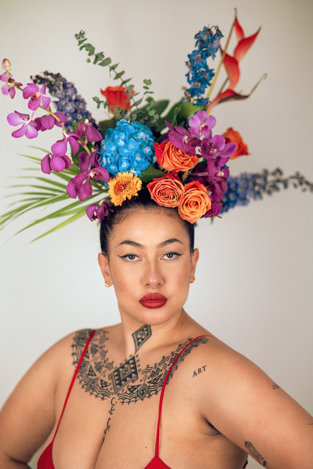 Karaunatia: A self-portrait from Ashley Emiko's exhibition titled For The People. Here, Ashley wears a headpiece crafted from fresh pua/putiputi to represent her Hawaiian heritage. Photo / Ashley Emiko 
