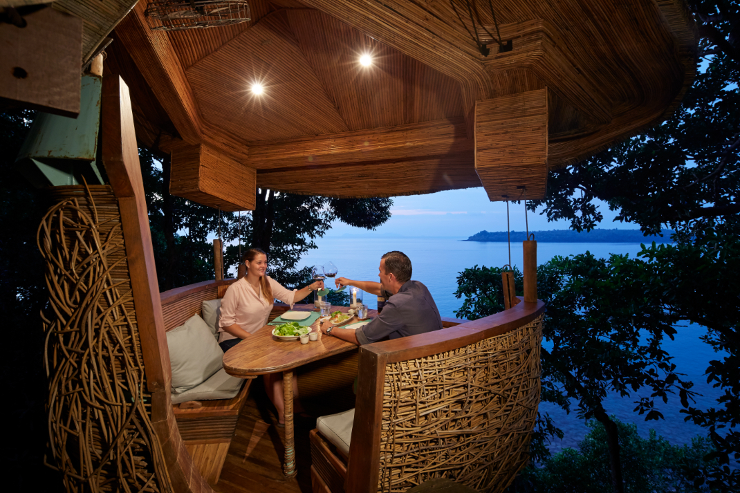 The Treepod Dining experience at Soneva Kiri Eco Resort in Thailand allows guests to dine 60 feet above the rainforest canopy, with meals delivered via zipline. Photo / Treepod Dining Soneva Kiri Resort 