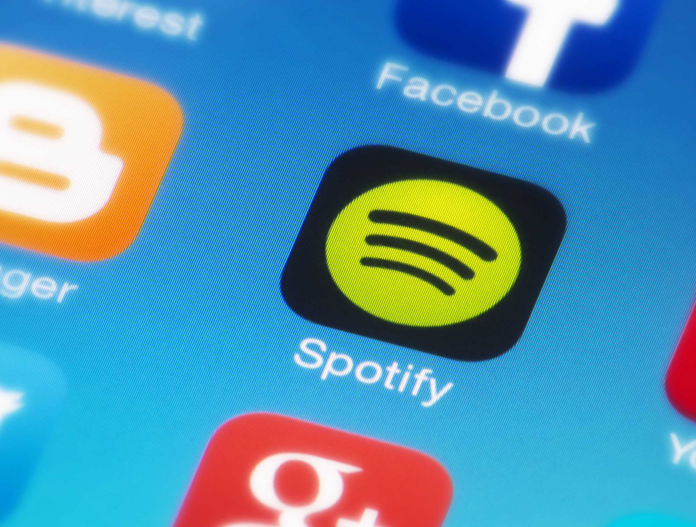 While Spotify has grown its podcast listenership to 100 million, generating money from this audience has proven elusive. Photo / 123RF