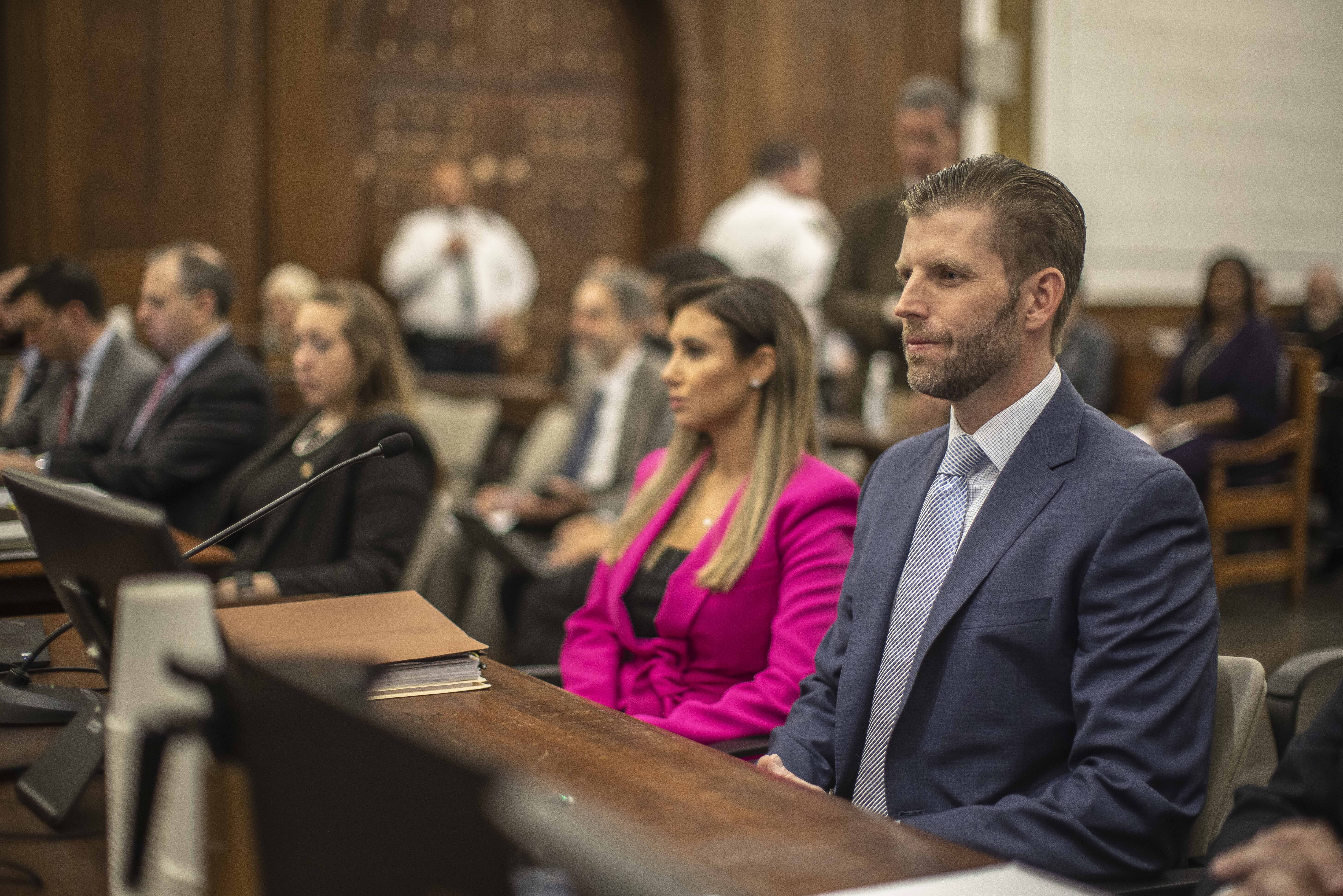 Eric Trump, son of former President Donald Trump, second from left, is seated ahead of his second day of testimony at New York State Supreme Court. Photo / AP