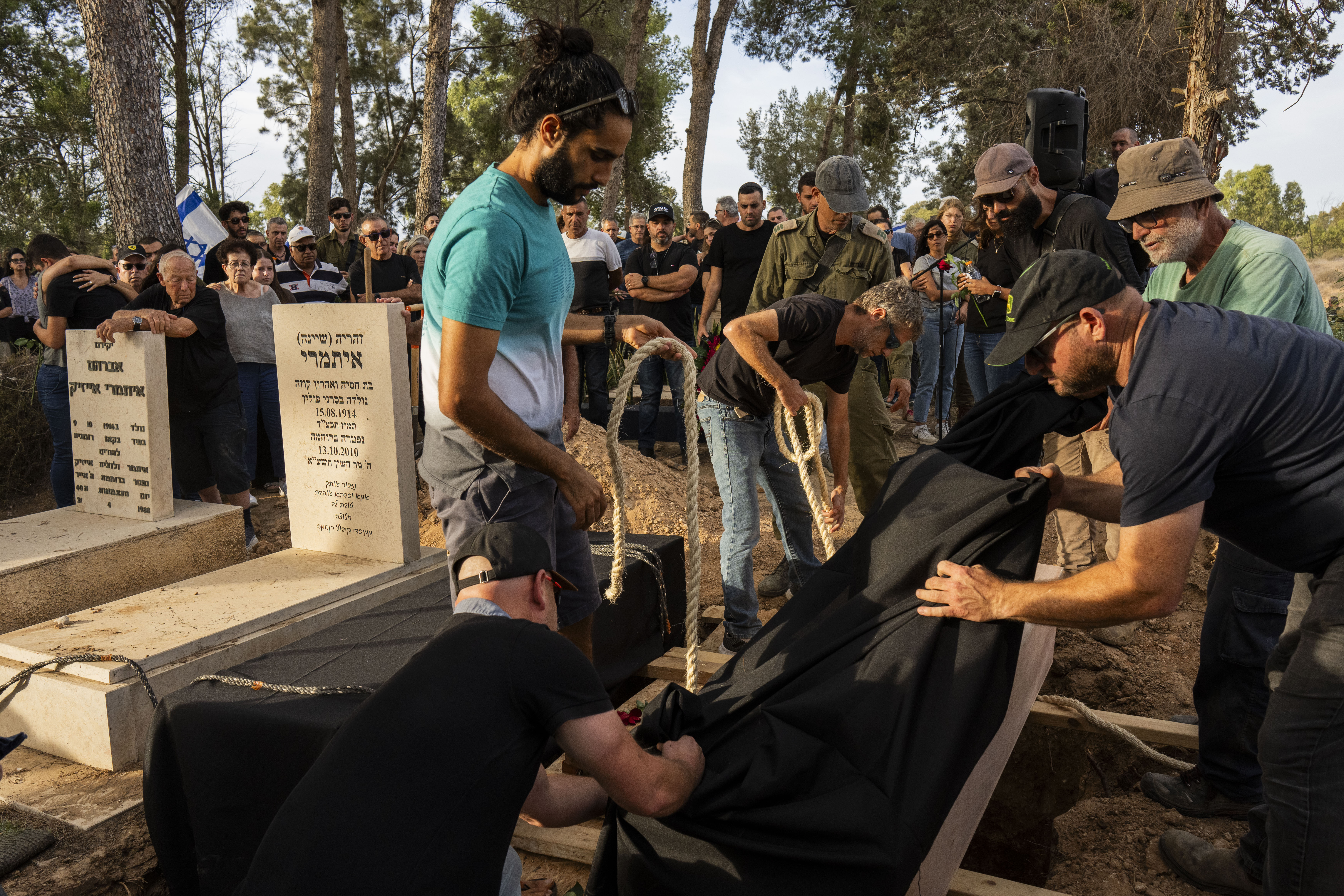 Relatives and friends attend the funeral of Lili Tamari and Ram Itamari at the Rukhama cemetery, south Israel. Photo / AP
