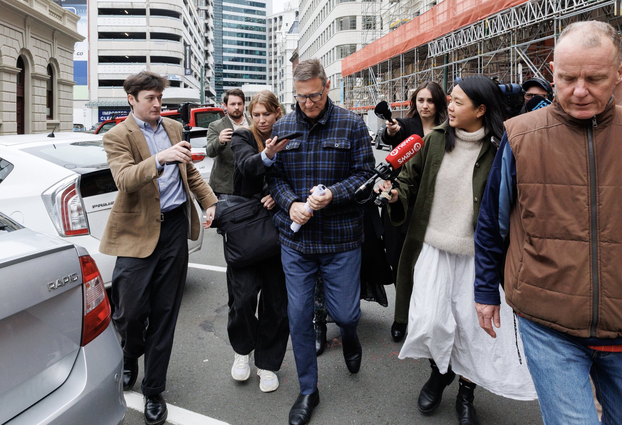Jevon McSkimming is pursued by media as he leaves the Wellington District Court, Wellington, 04 August, 2025.  NZ Herald photograph by Mark Mitchell





 














