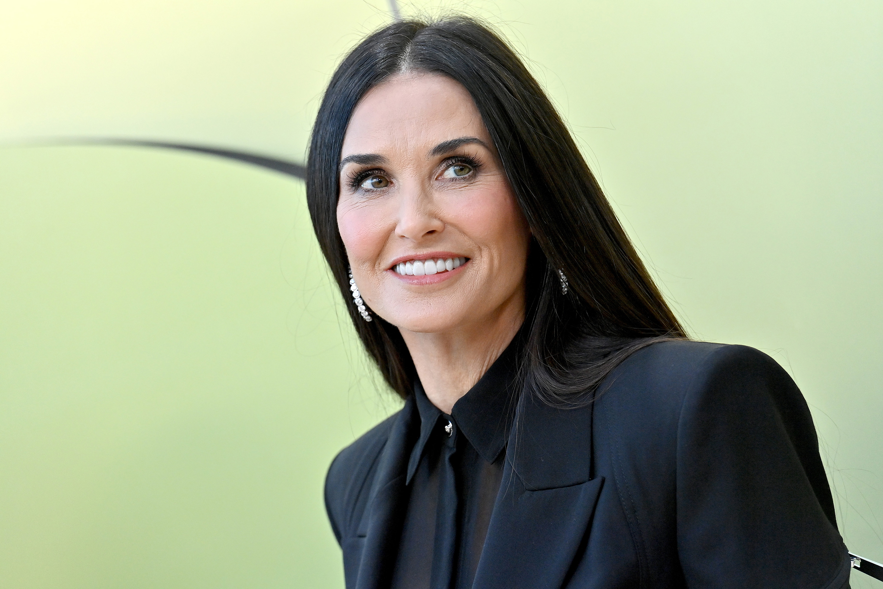 Demi Moore's latest film The Substance satirically takes aim at the commodification of women. Photo / Getty Images