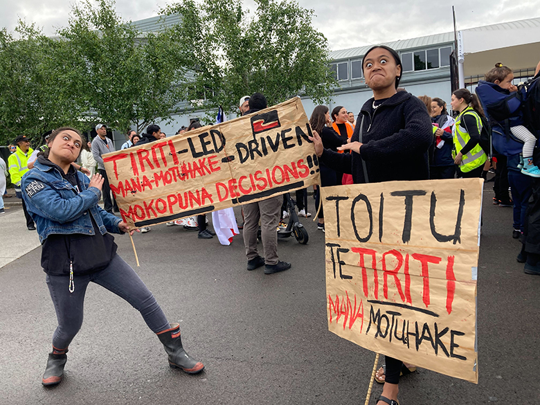 Vanessa Paraki, left, and Taniko Rangihau were among those holding signs. Photo / Laura Smith