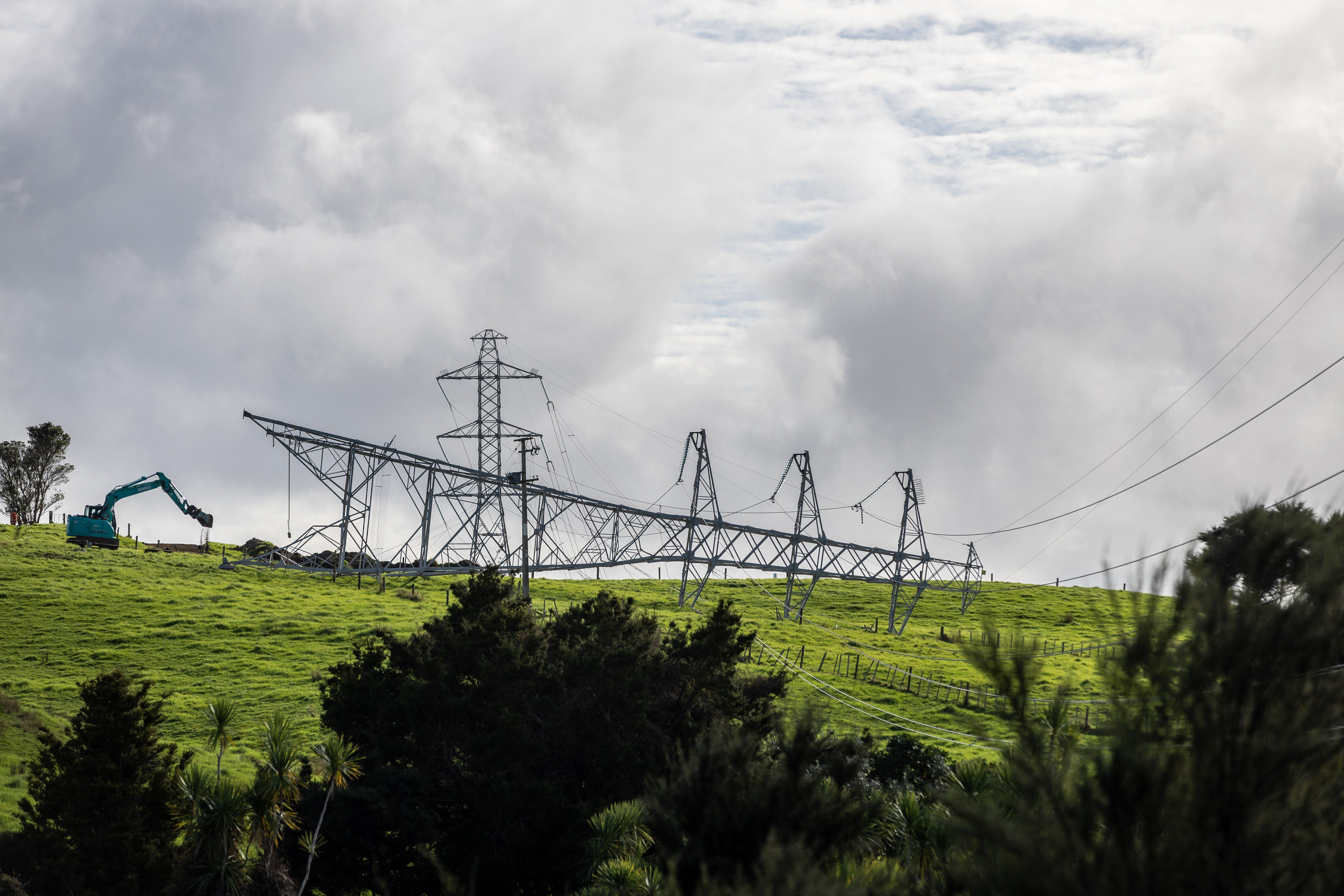 The Transpower pylon at Glorit, near Wellsford, fell over on June 20 after a contractor removed too many nuts from the base of the pylon. Photo / NZME