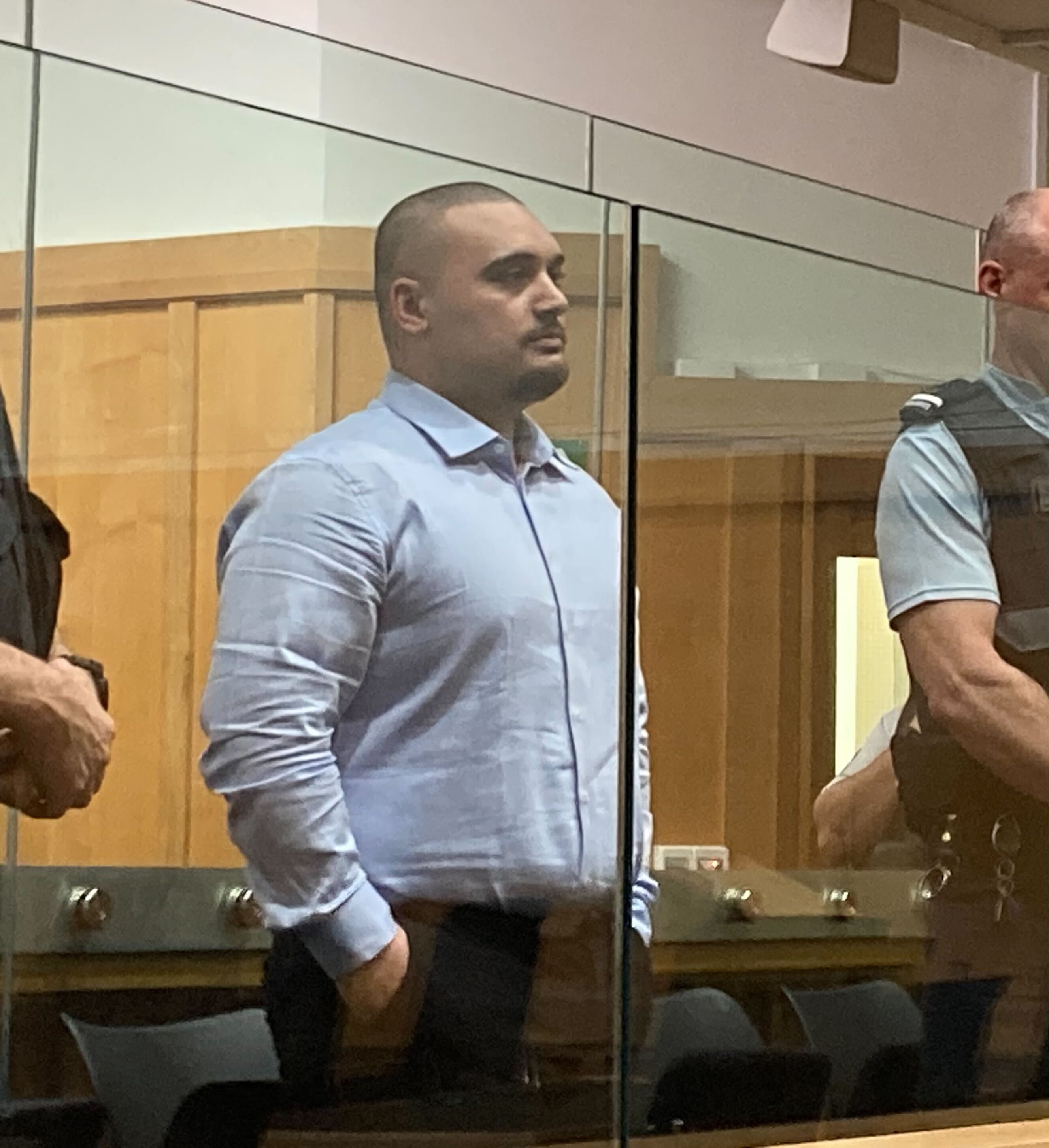 Kane Ronaki, 25, pictured in the dock of the High Court at Hamilton, was not given a jail or a home detention sentence to enable him to keep his job. Photo / Belinda Feek