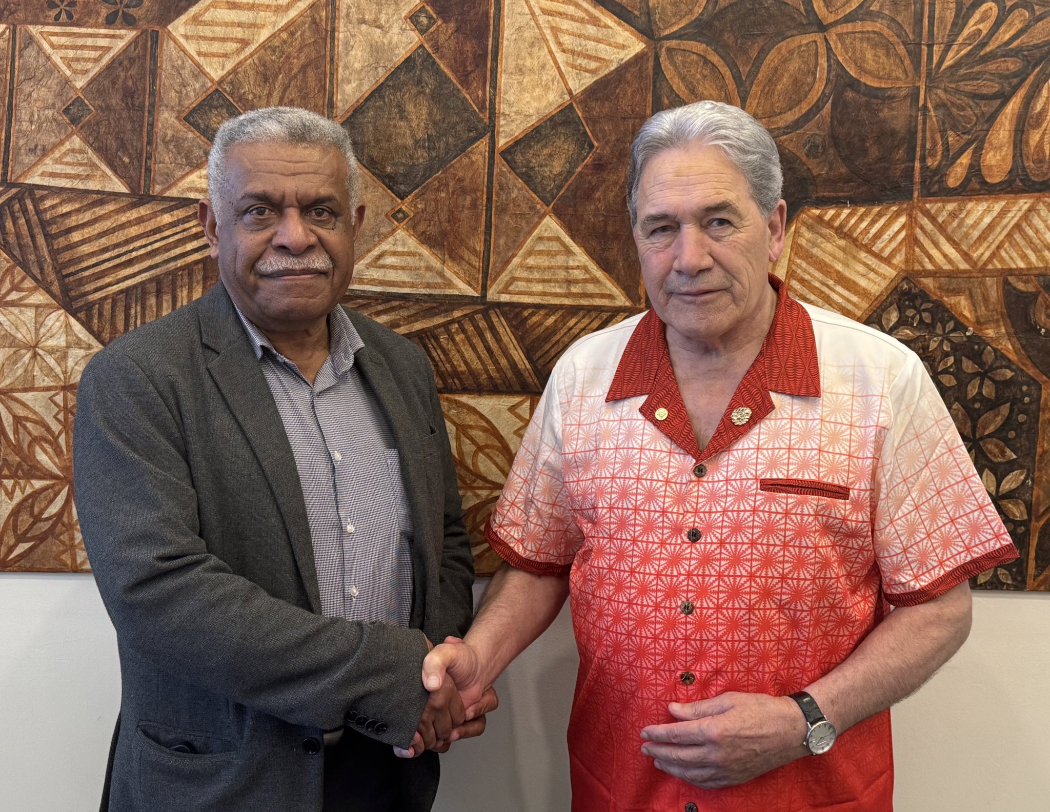 New Caledonia president Louis Mapou (left) meets Foreign Minister Winston Peters (right) while at the Pacific Islands Forum in Tonga. Photo / Supplied