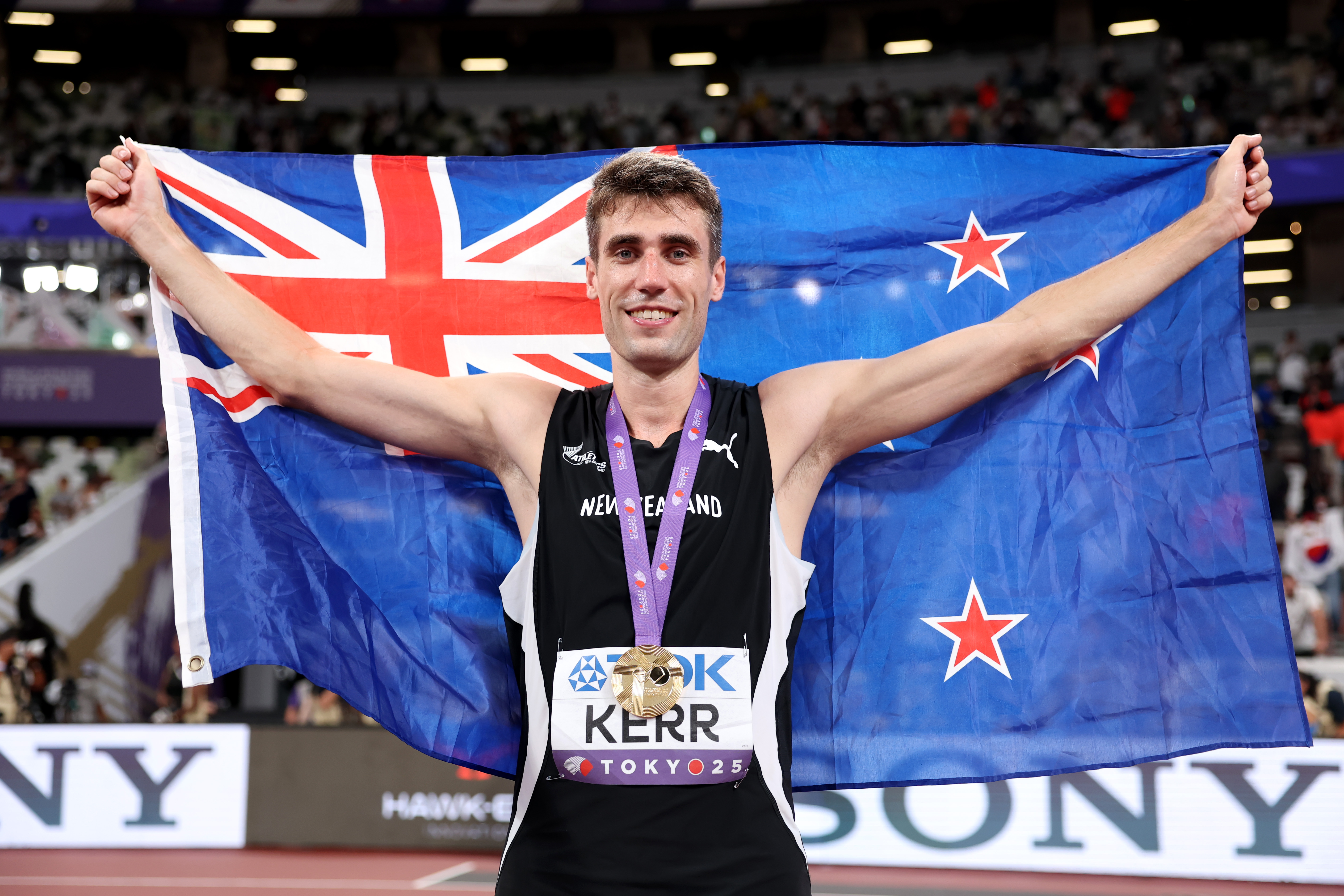 Gold medalist Hamish Kerr of New Zealand poses after winning the high jump final on day four of the World Athletics Championships Tokyo 2025. Photo / Getty Images