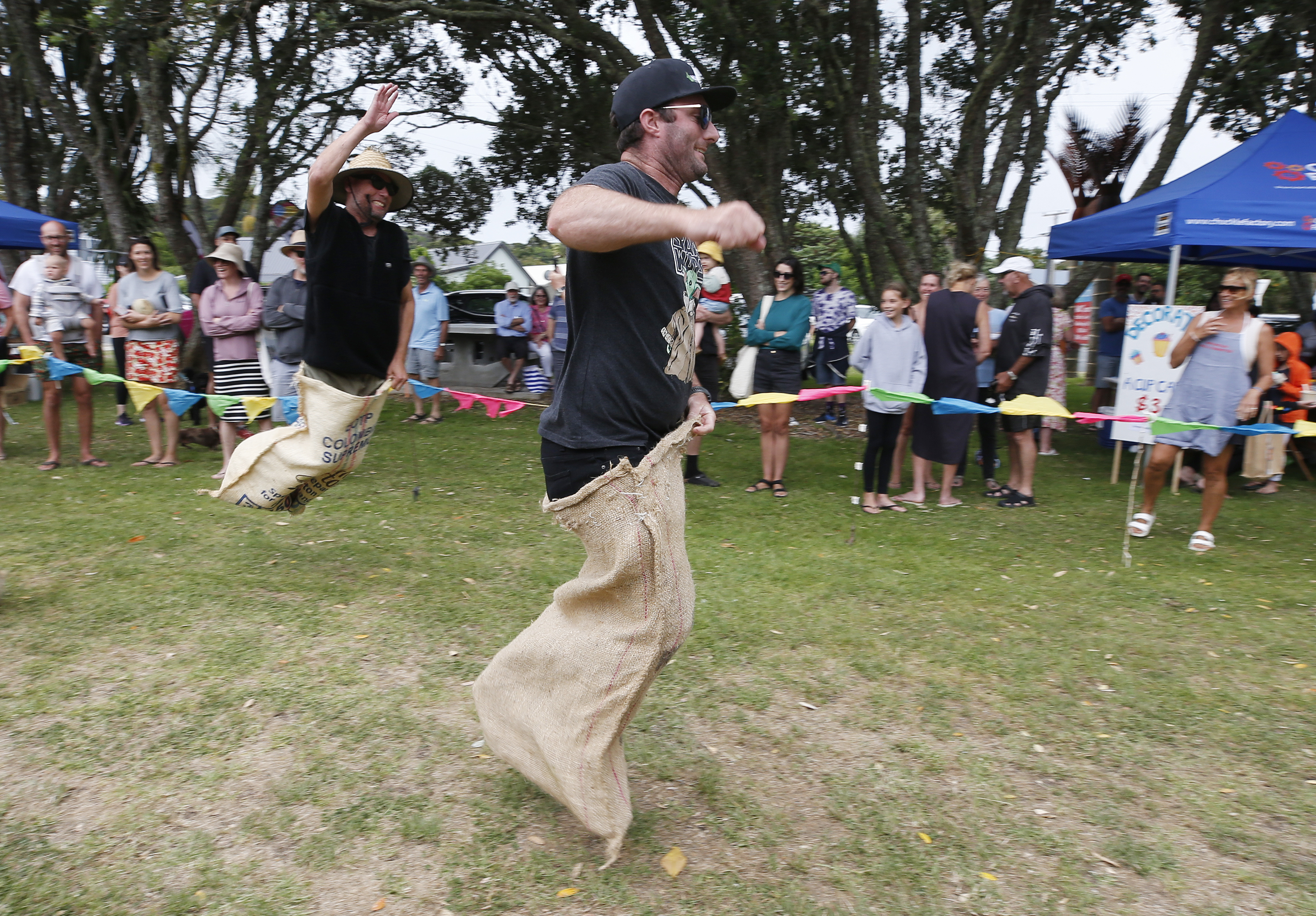 First-place-getter Bryce Mason, from Christchurch, performed a spectacular tumble over the line to claim first place in the adults' sack race at the gala day.