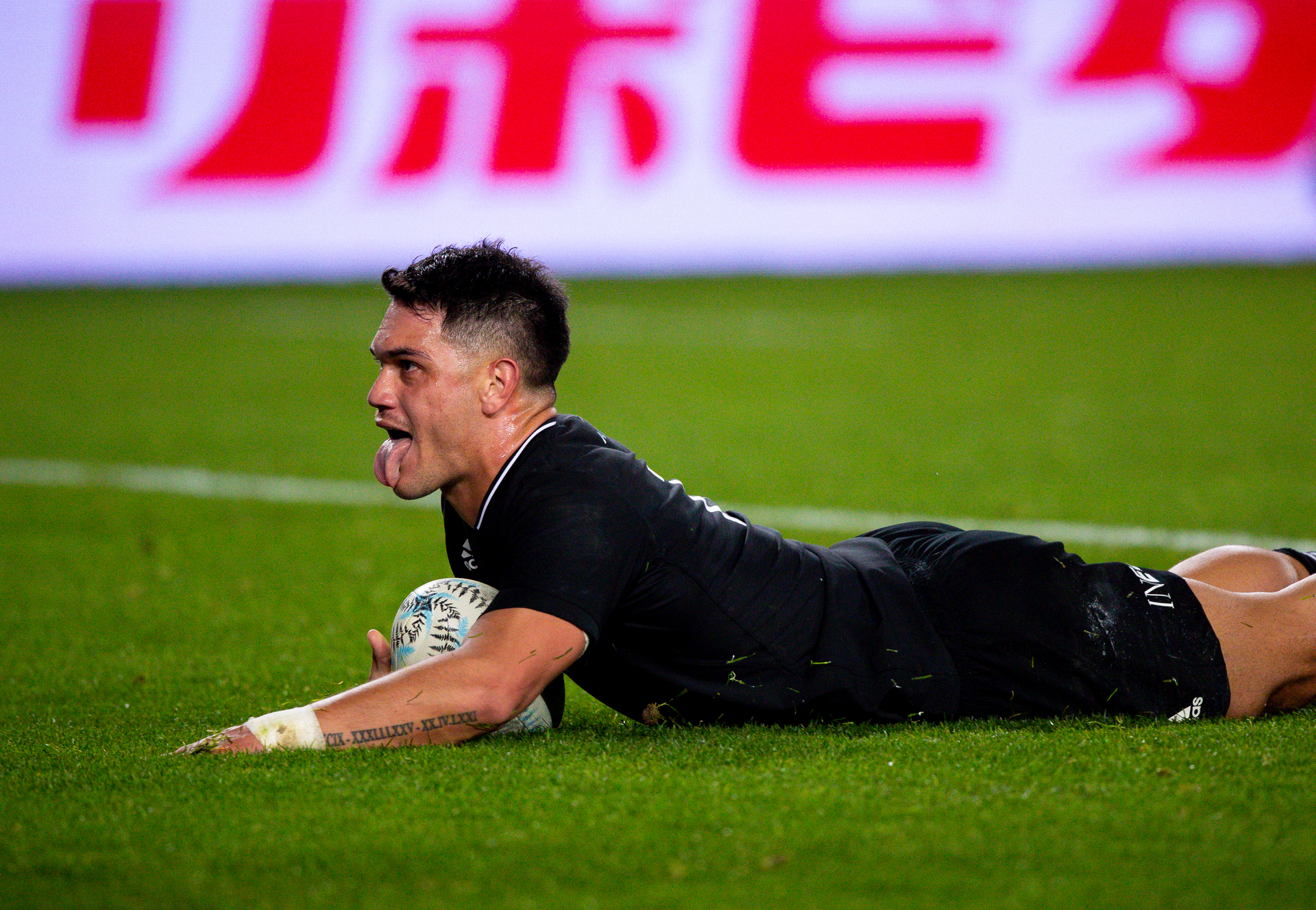 Quinn Tupea scores for the All Blacks against Ireland at Eden Park in 2022. Photo / Dean Purcell