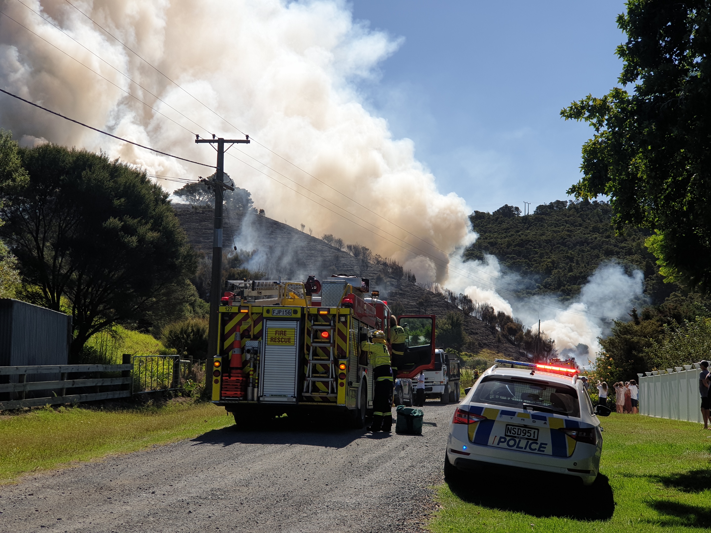The 2ha fire was spreading smoke around Ngunguru on Monday afternoon. Photo / Jordan Linton Photography