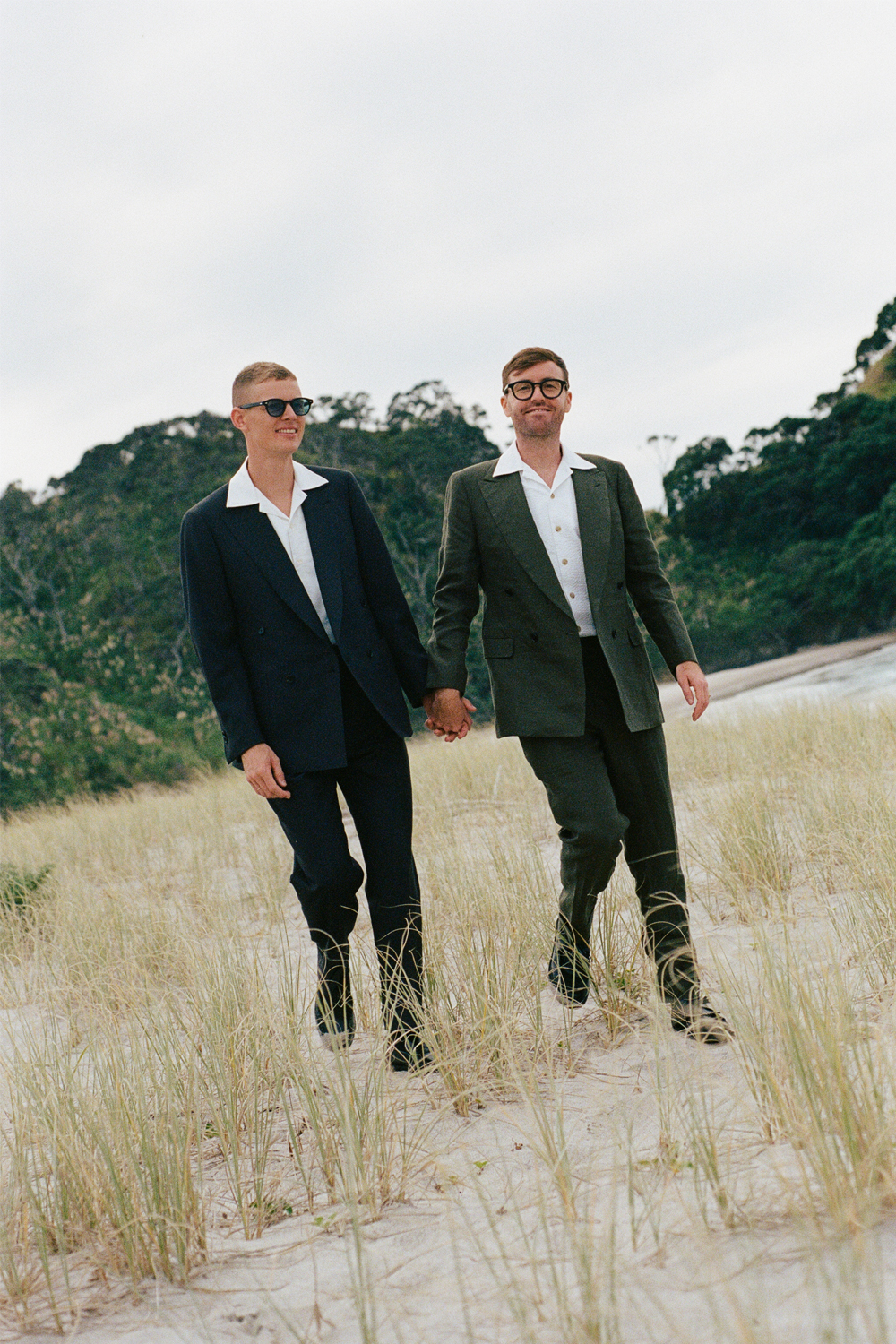 Both suits came from Sydney-based tailor P. Johnson, each reflecting their own personal style. Will’s suit is made from their Forest Green Linen and Cam’s from their Dark Brown Wool. Photo / Poet Pictures