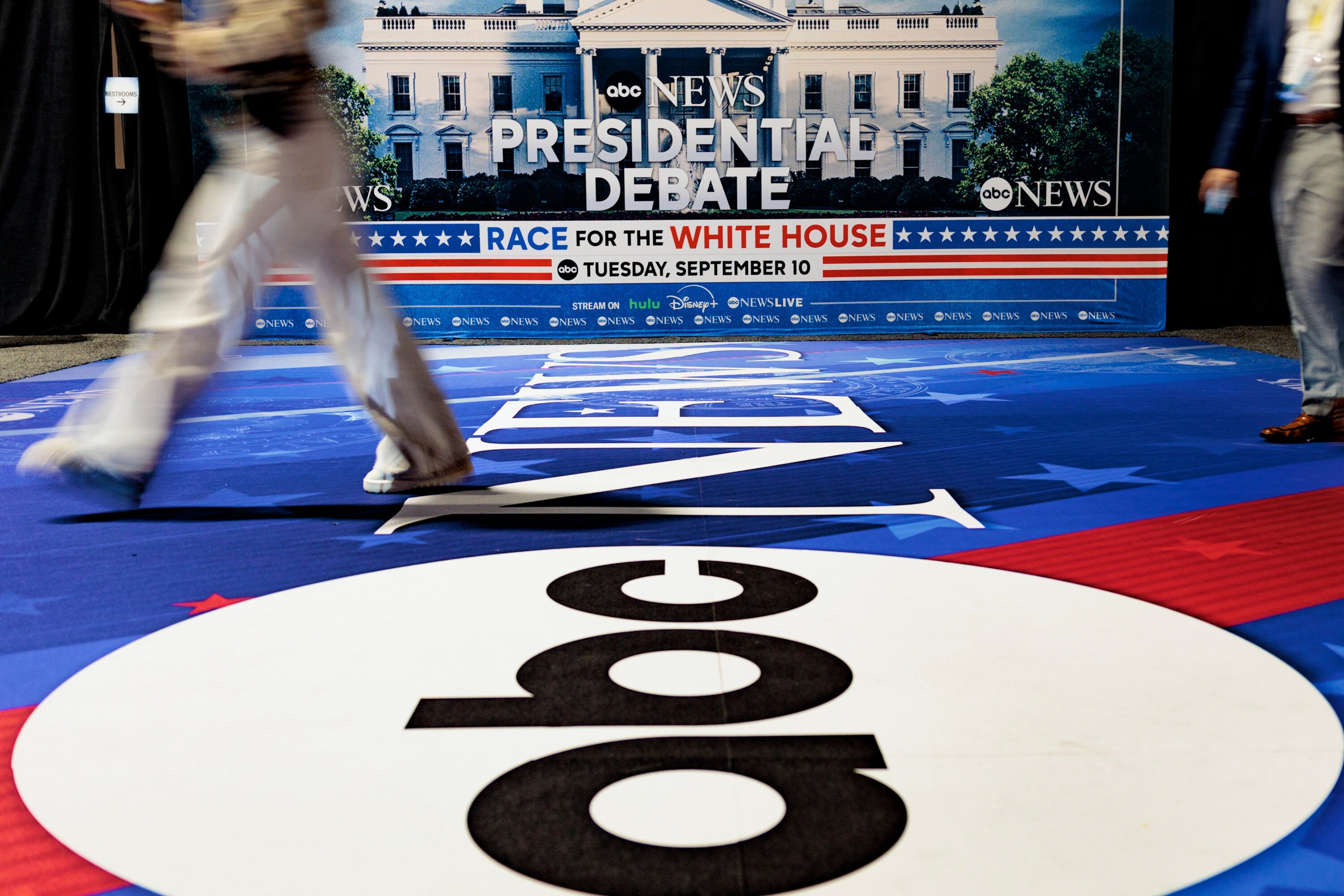 Signage in the spin room ahead of the second presidential debate at the Pennsylvania Convention Center in Philadelphia. Photo / Getty Images