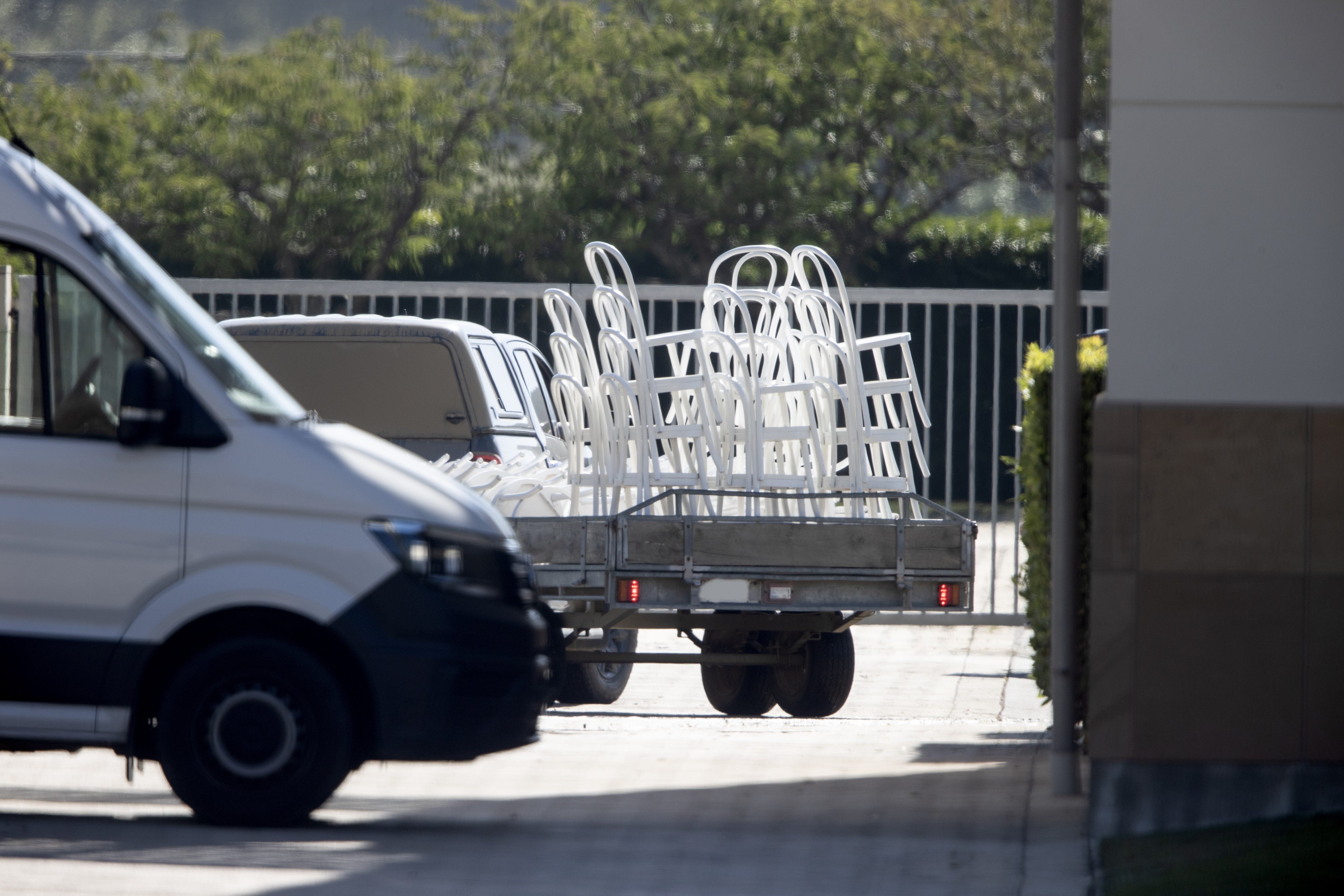 A trailer load of white wedding chairs has been towed to the vineyard where the ceremony will take place later today. Photo / George Heard