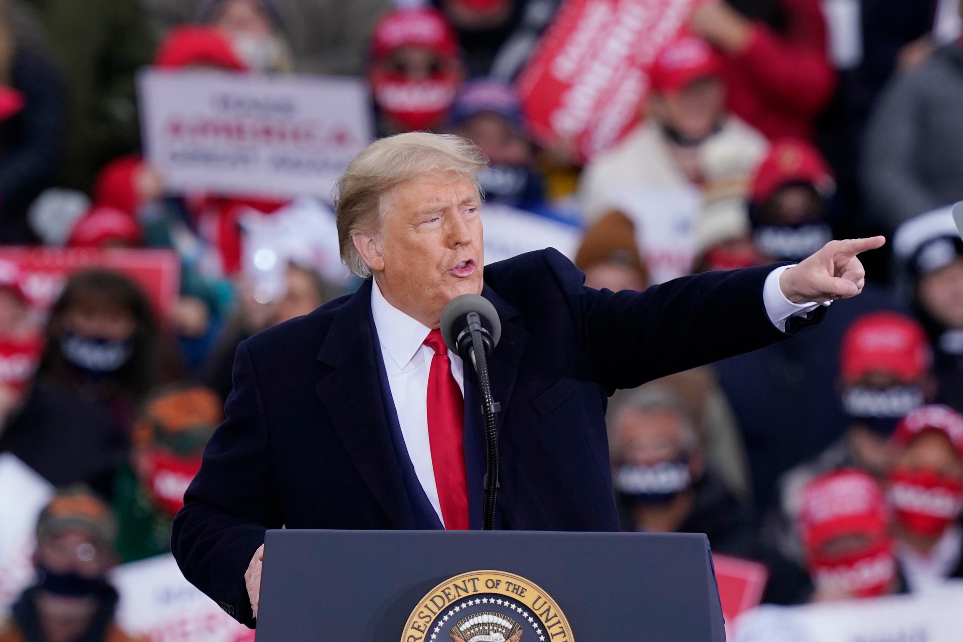 US President Donald Trump speaks at a campaign rally yesterday in Norton Shores, Michigan. Photo / AP