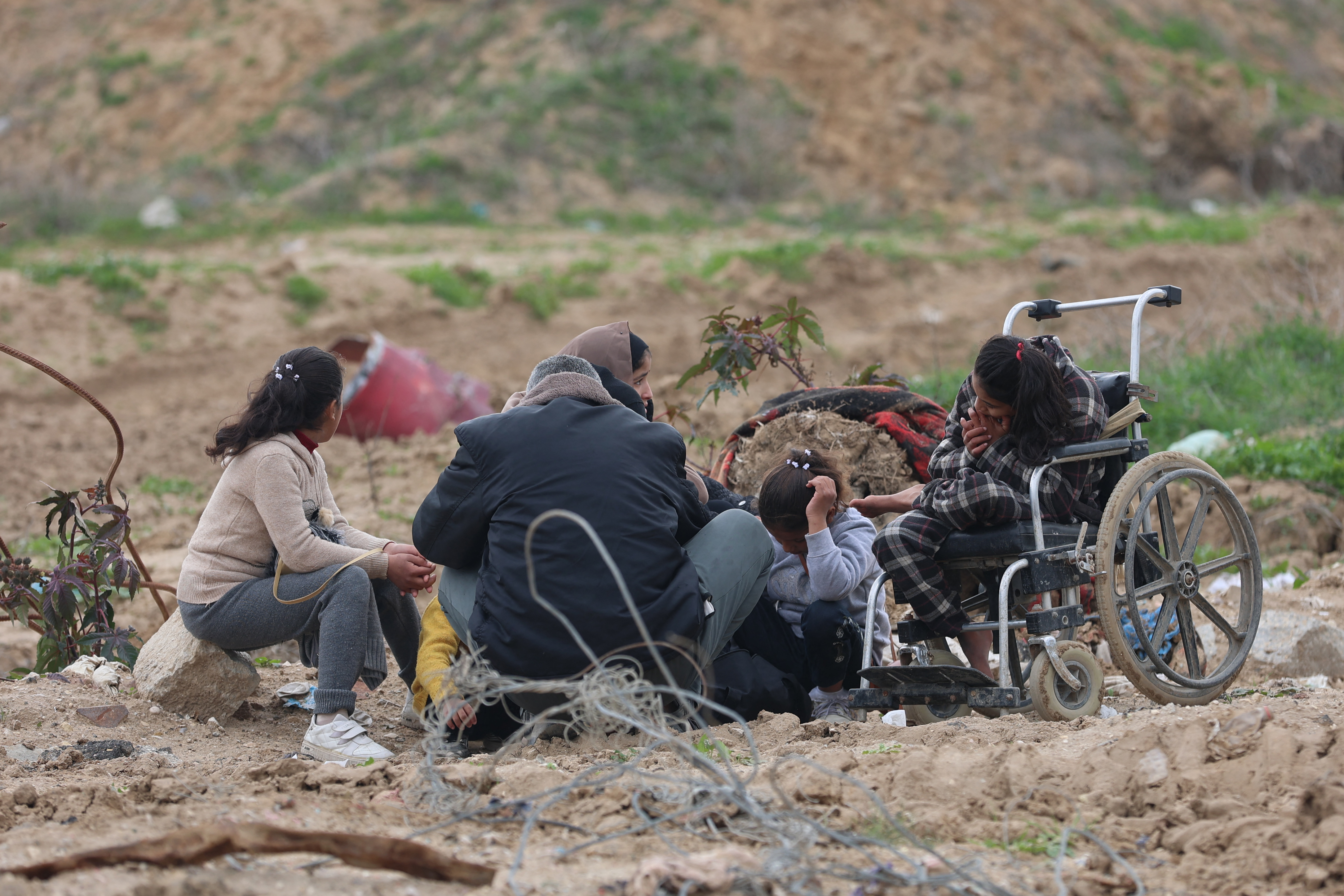 Displaced Palestinians rest on the road as they cross the Netzarim Corridor on their way to the northern parts of the Gaza Strip on February 9, 2025. Photo / Omar AL-QATTAA / AFP