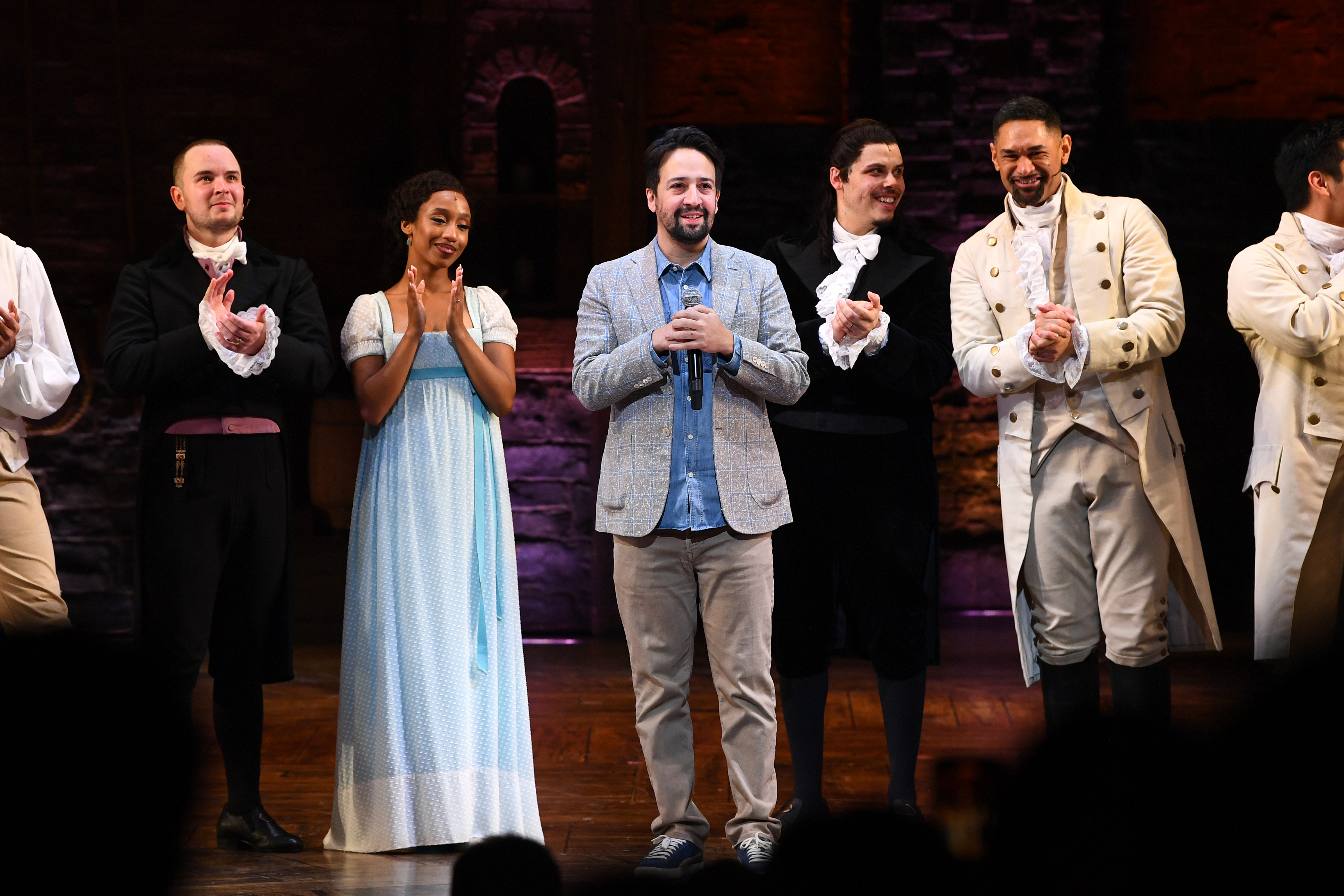 Miranda on stage with the Australian cast of Hamilton.
