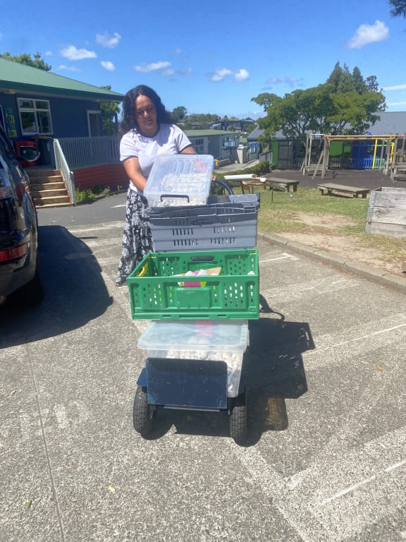 Receptionist Patricia delivering lunches at Massey Primary School. Photo / Louise Ternouth, RNZ