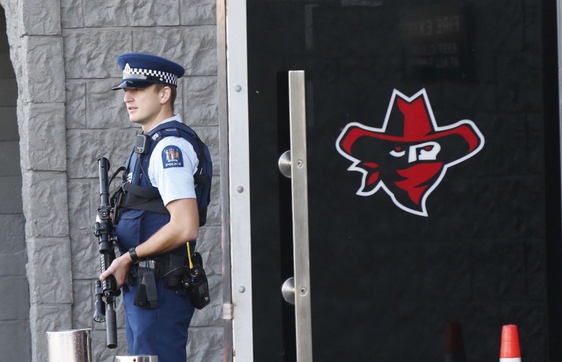 Police search Headhunters HQ in Ellerslie. Armed police at all entries to the building with members of the gang gathering outside. Photo / Nick Reed