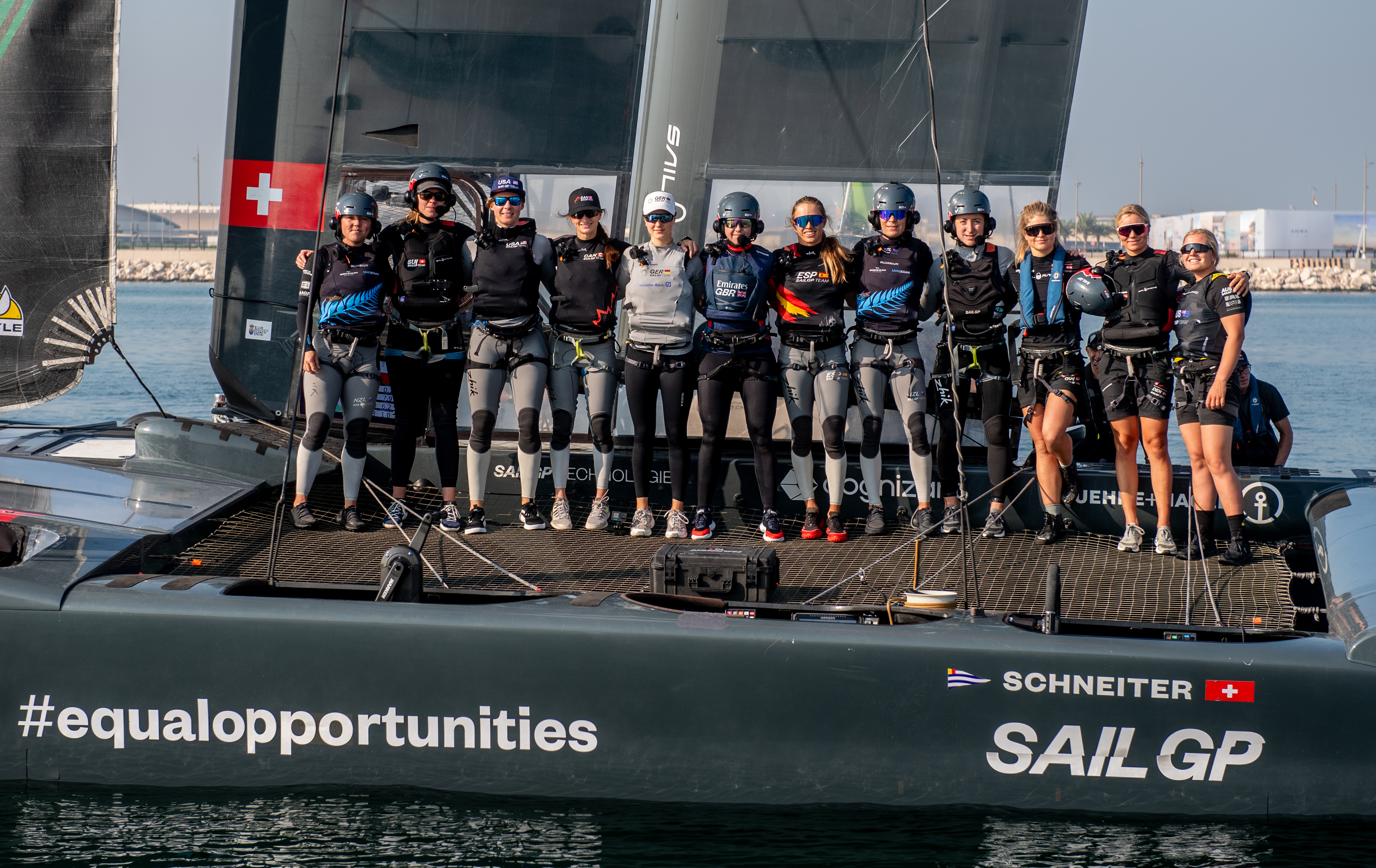 Liv Mackay (far left) was one of 12 sailors to take part in an all-female sailing session on board the Swiss SailGP Team's F50. Photo / SailGP